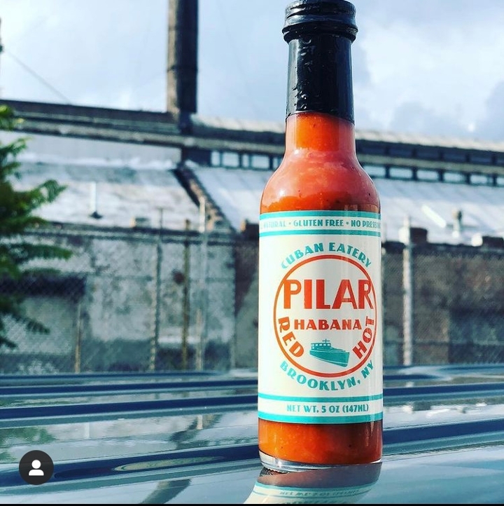 Order Hot Sauce Bottle food online from Pilar Cuban Eatery store, Brooklyn on bringmethat.com