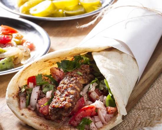 Order Ukrainian Lamb and Beef Wrap food online from East and Feast Lounge store, Austin on bringmethat.com