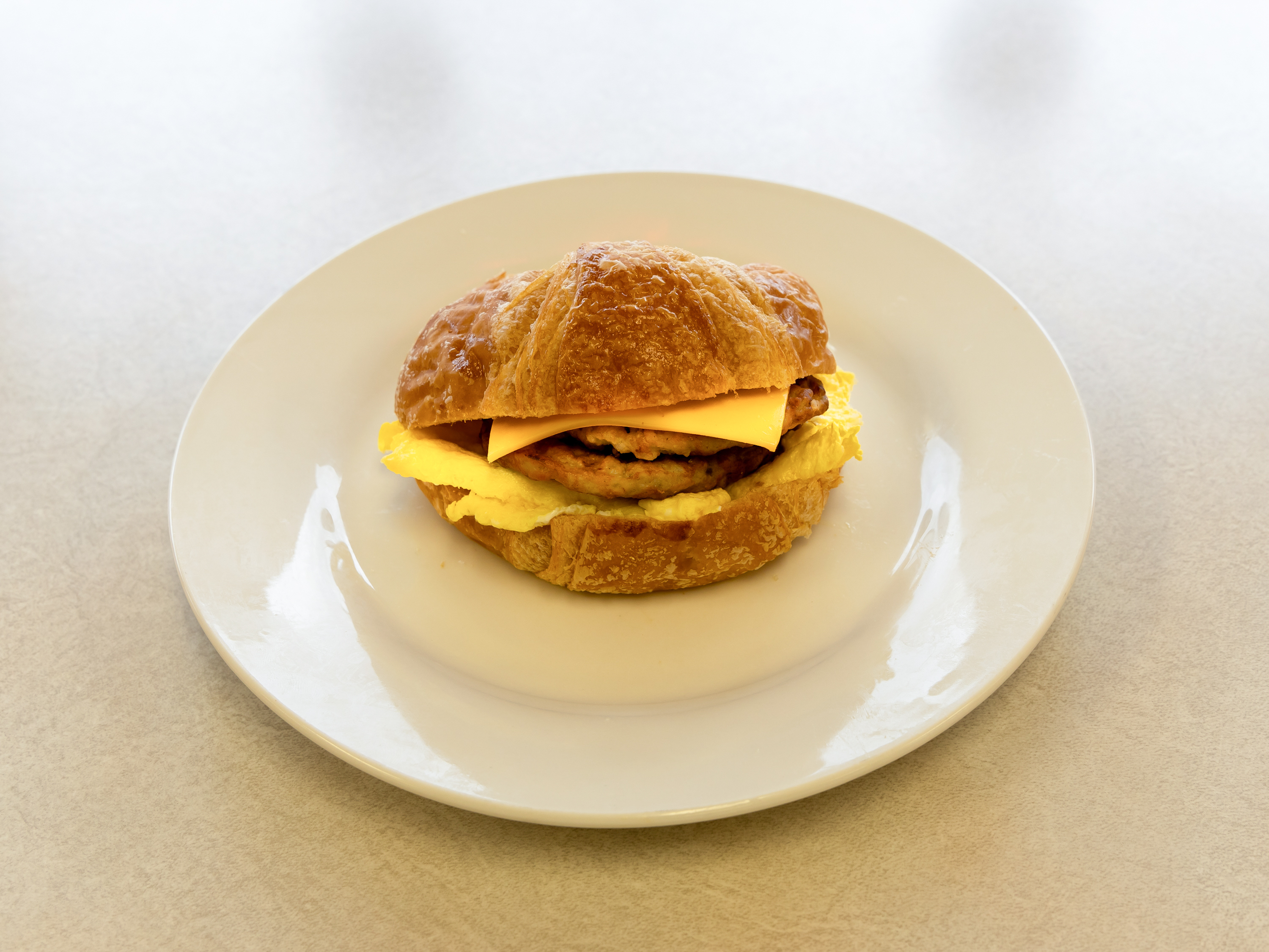 Order Sausage Egg and Cheese Taco food online from Mr. Donut And Kolache store, Jersey Village on bringmethat.com