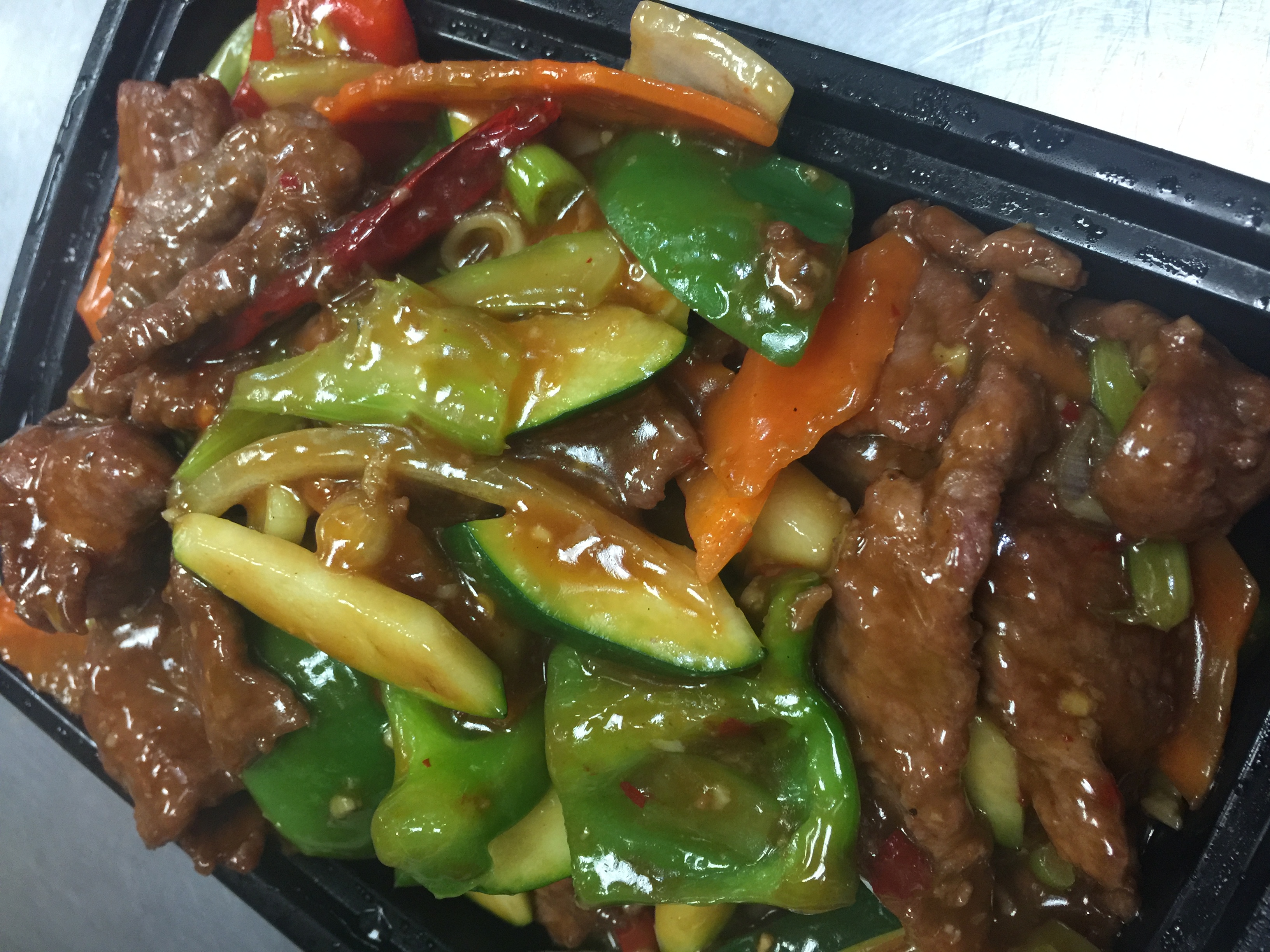 Order Garlic Beef food online from China West Express store, Tustin on bringmethat.com