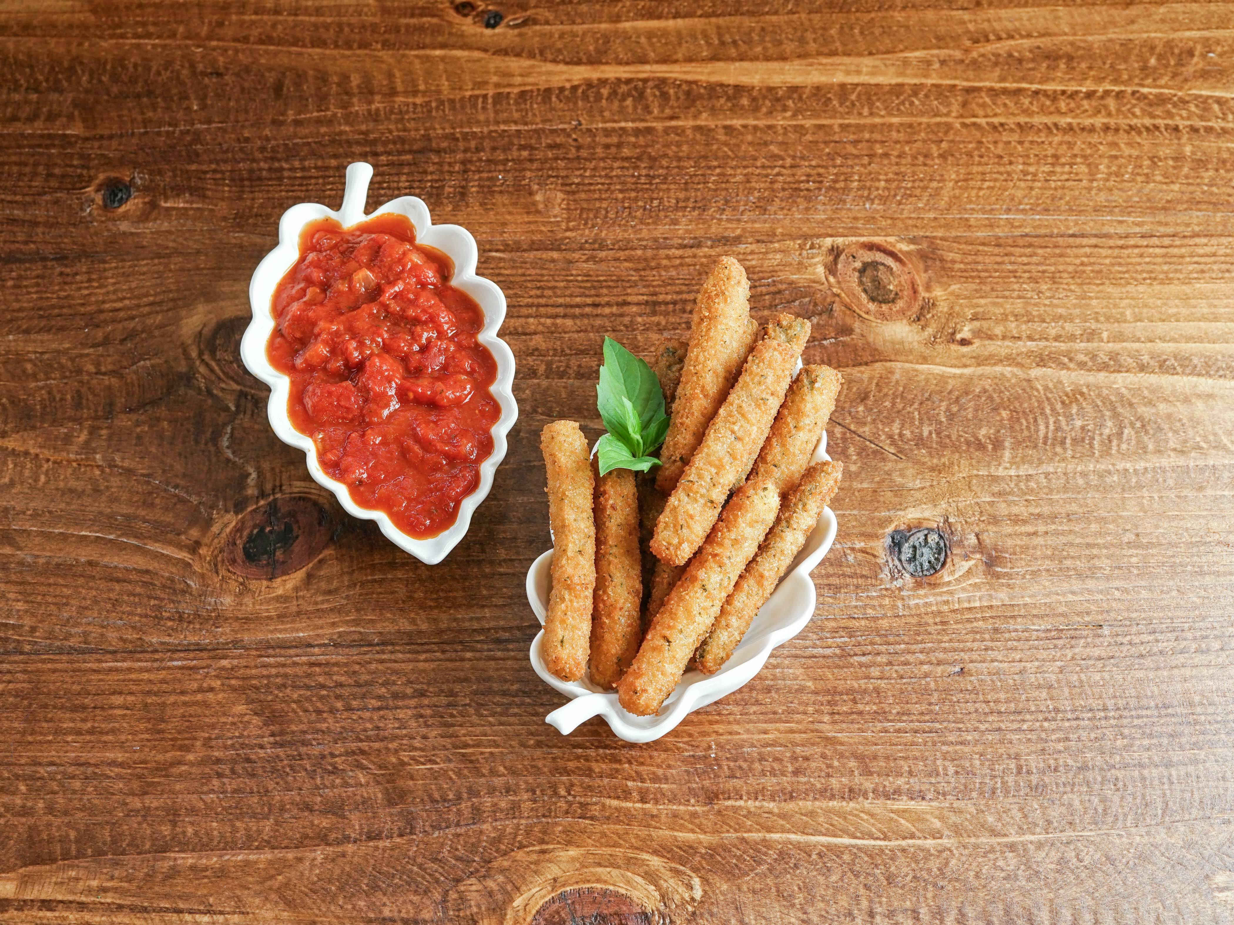 Order Zucchini Sticks food online from Milano's Pizza - Gaithersburg store, Gaithersburg on bringmethat.com