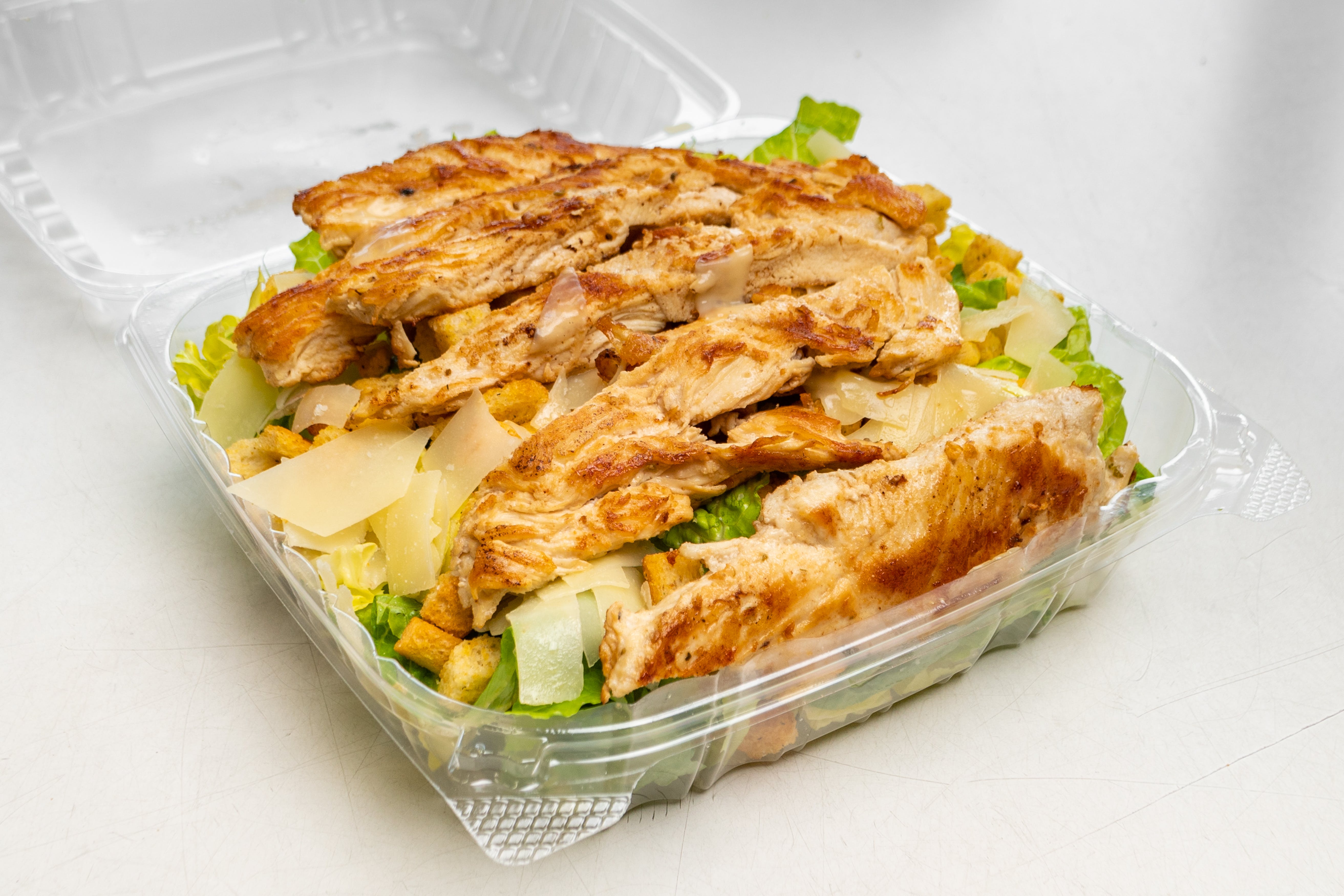 Order Chicken Caesar Salad - Salad food online from Pizzeria Santa Lucia store, Jessup on bringmethat.com