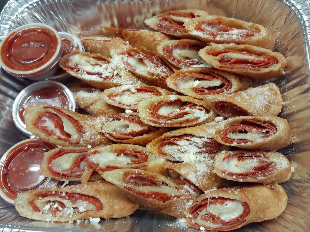 Order 1/2 Pan of Fried Pepperoni Rolls Special food online from Gibbie's Restaurant & Pub store, Morgantown on bringmethat.com