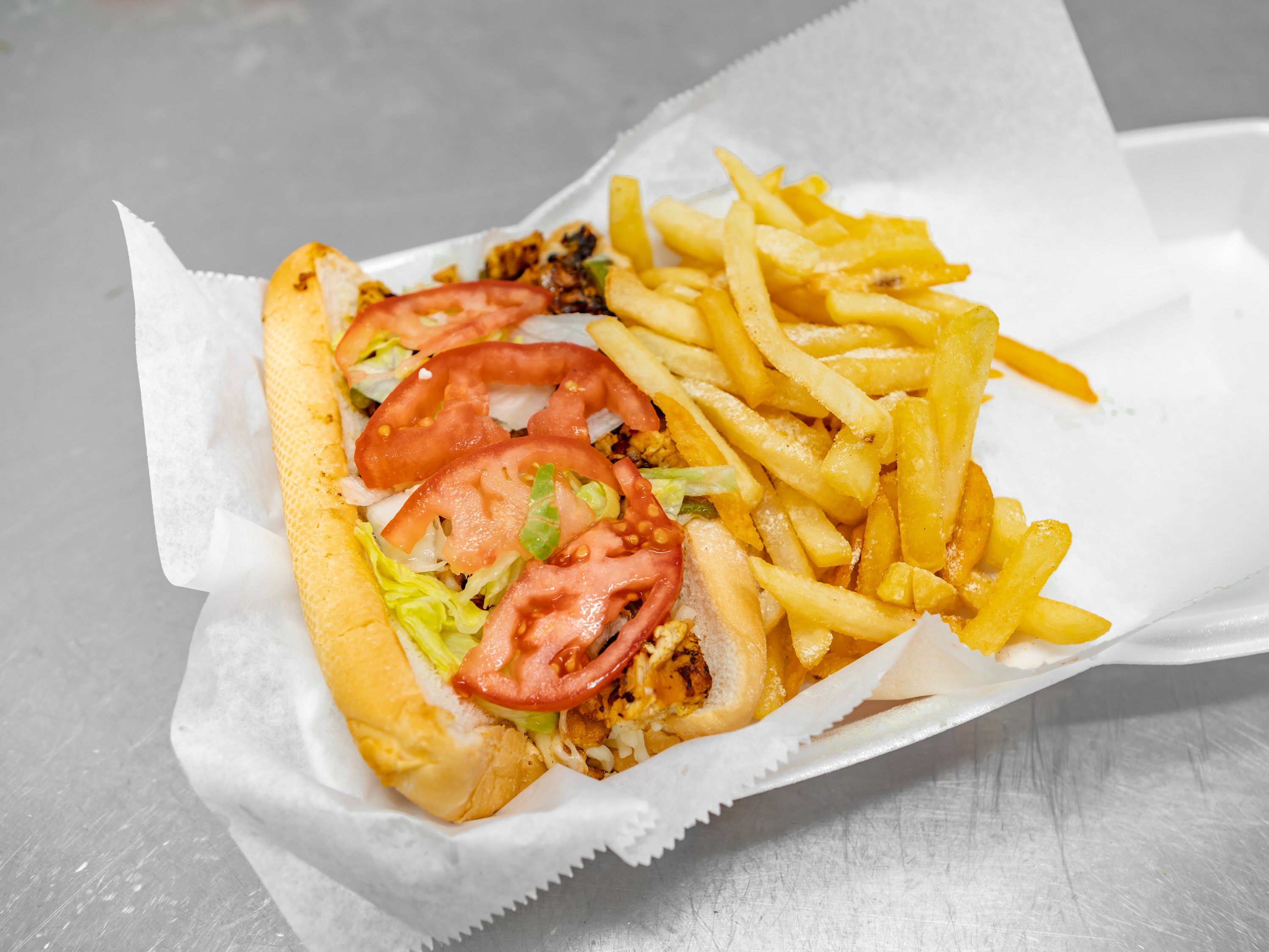 Order 26. Chicken Philly Sandwich food online from Pops Fish & Chicken Market store, Fairview Heights on bringmethat.com
