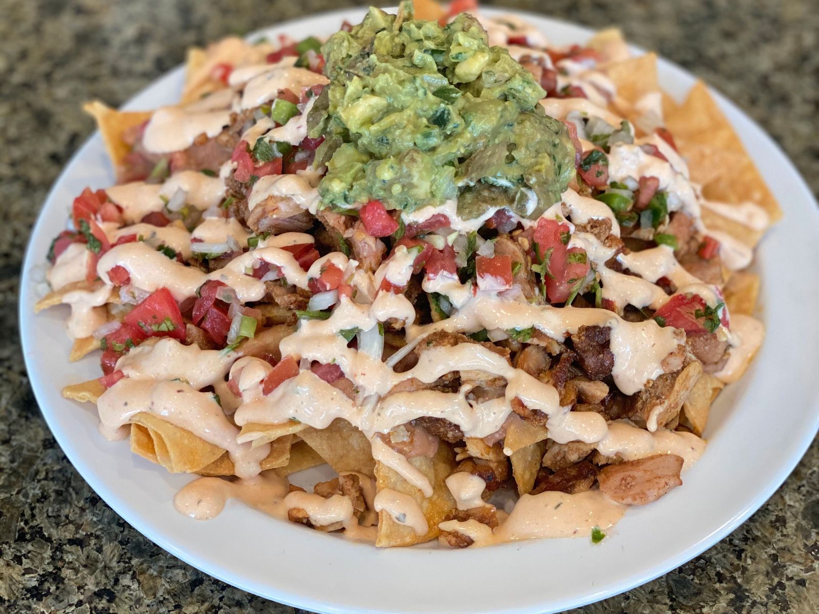 Order Nachos food online from Shalom Grill store, Los Angeles on bringmethat.com