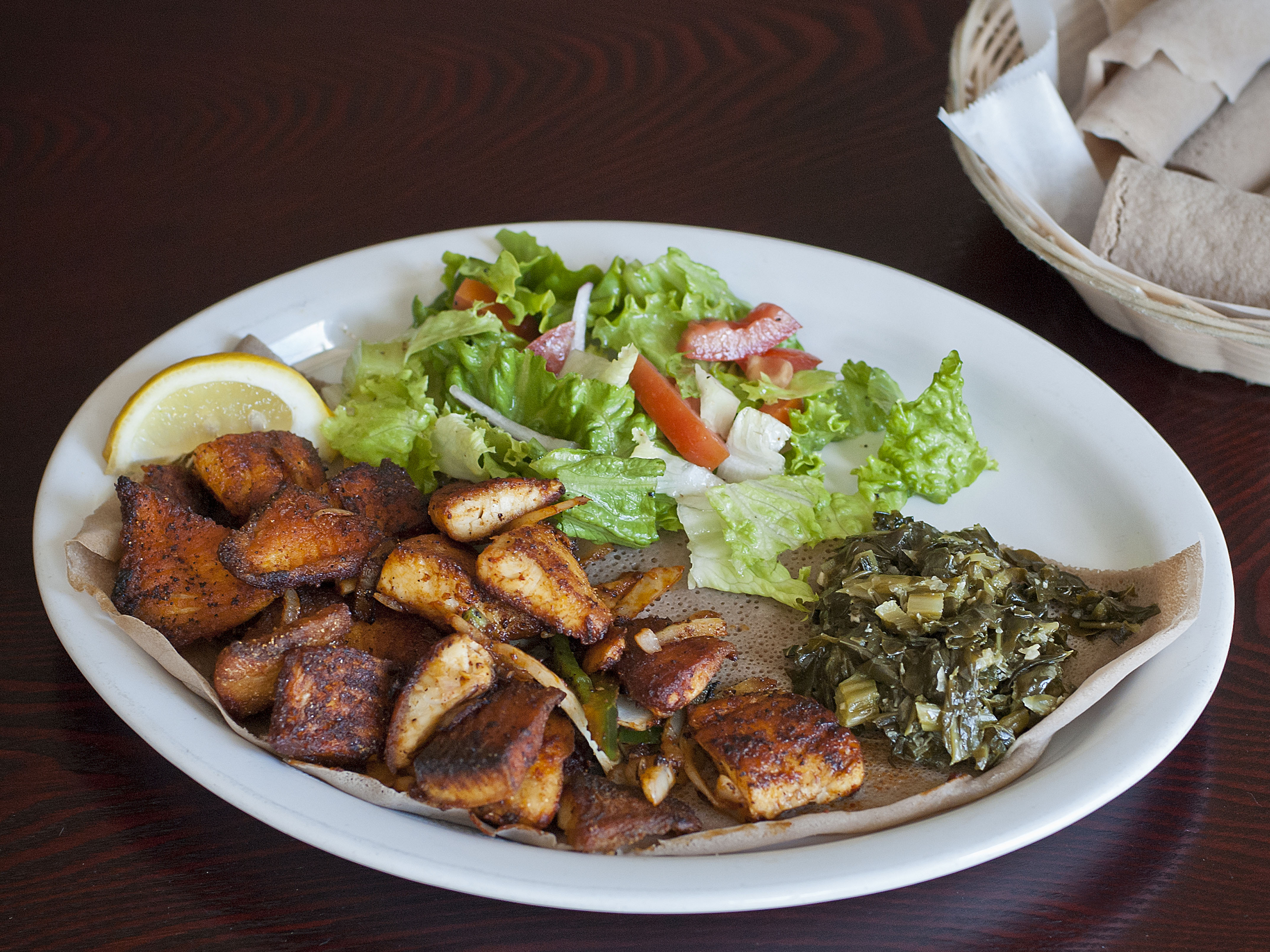 Order Fish Tibs food online from Abesha Ethiopian Cuisine store, Oakland on bringmethat.com