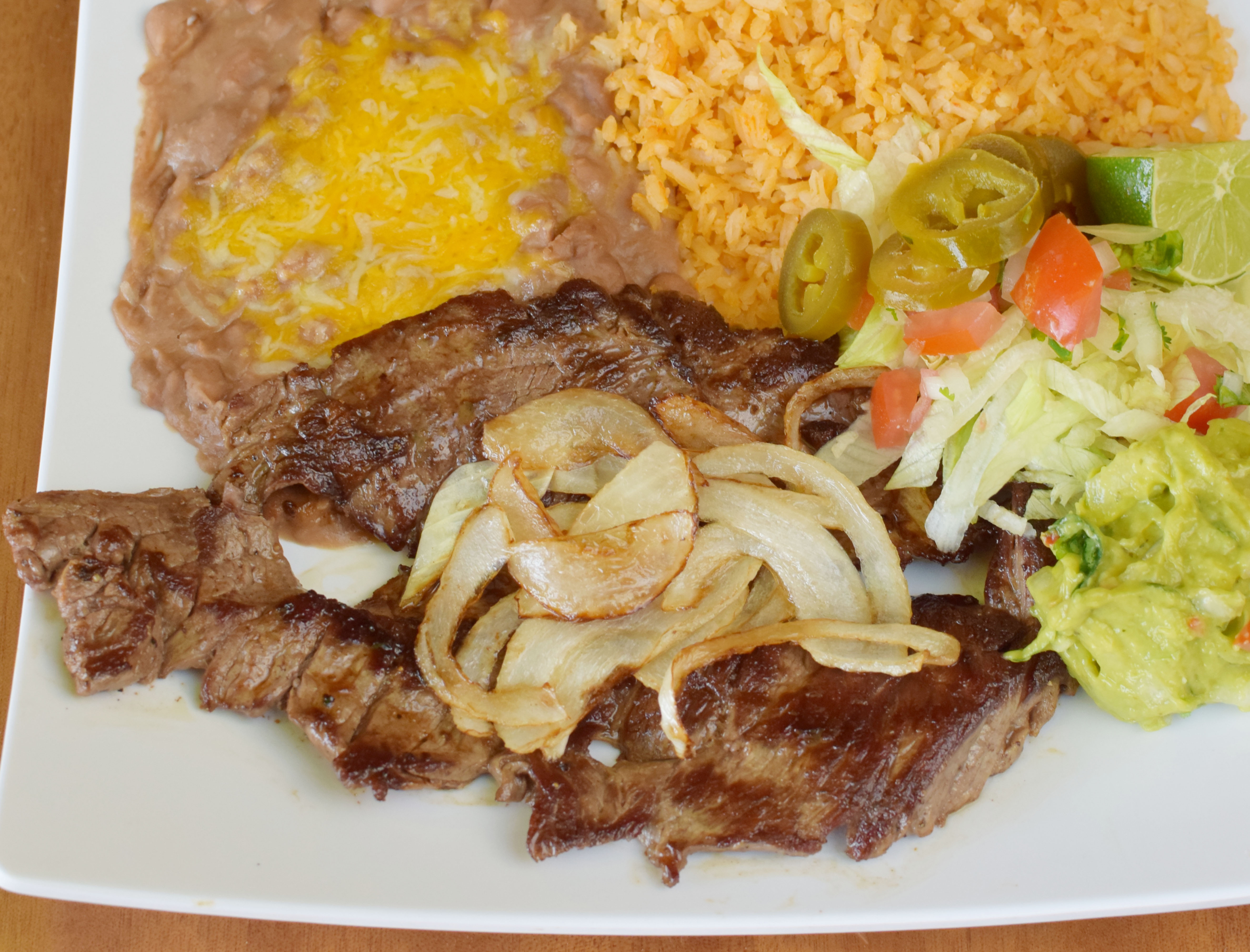 Order Carne Asada Combo Plate food online from El Sol Mexican Food store, Corona on bringmethat.com