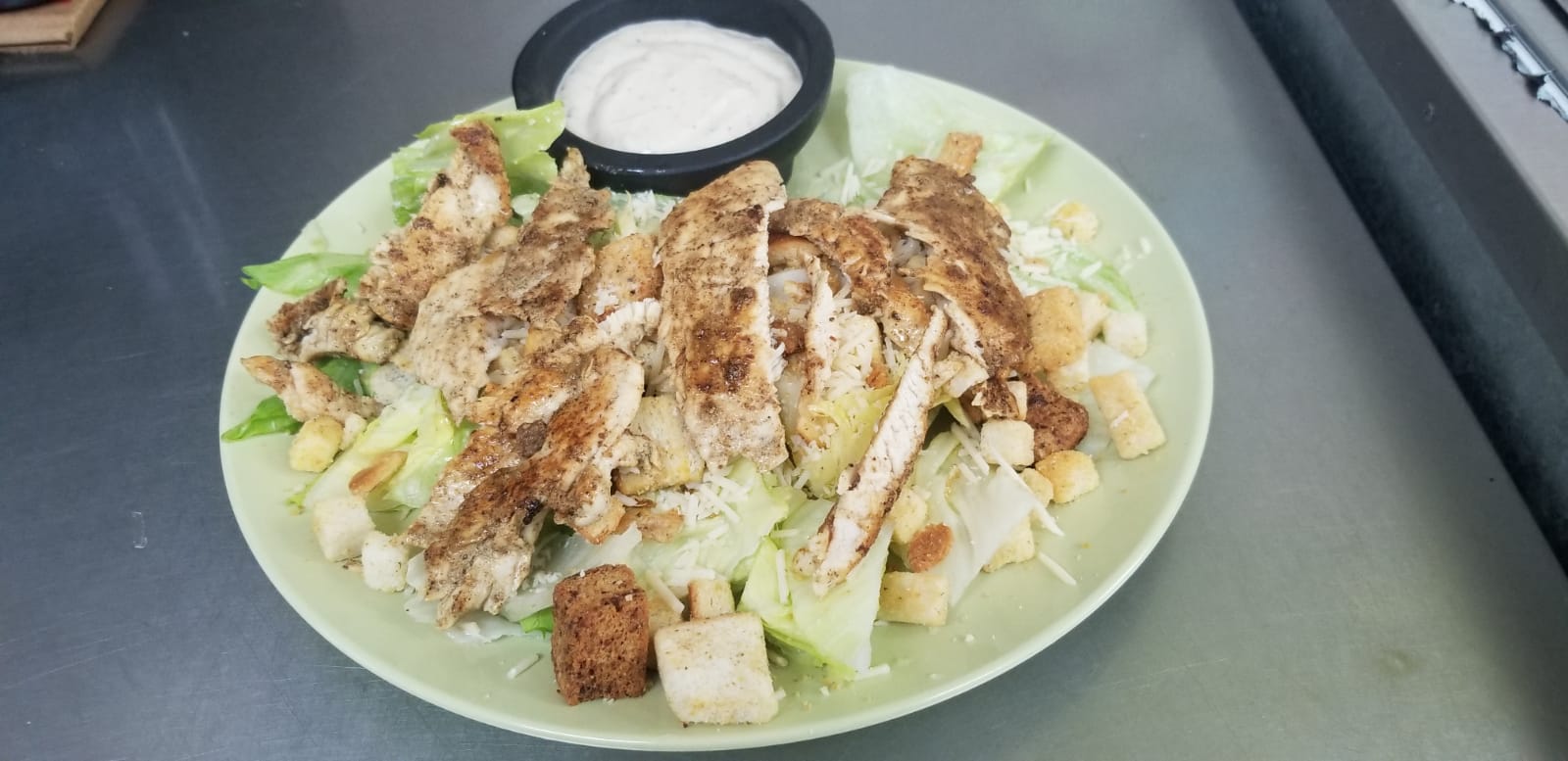 Order Chicken Caesar Salad food online from Aminas Cafe store, Bronx on bringmethat.com