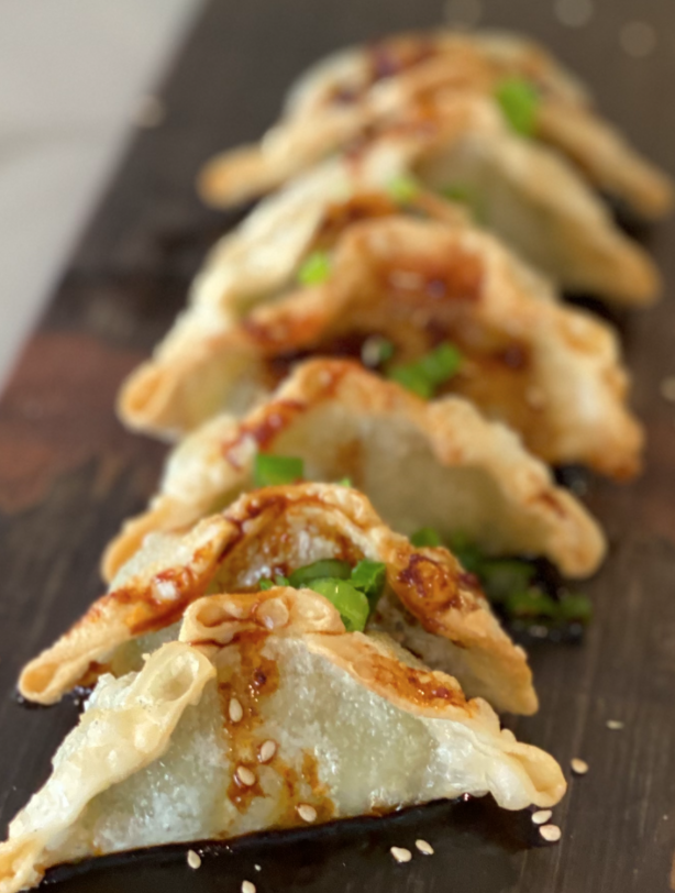 Order Szechuan Dumplings food online from Graze By Sam store, San Diego on bringmethat.com