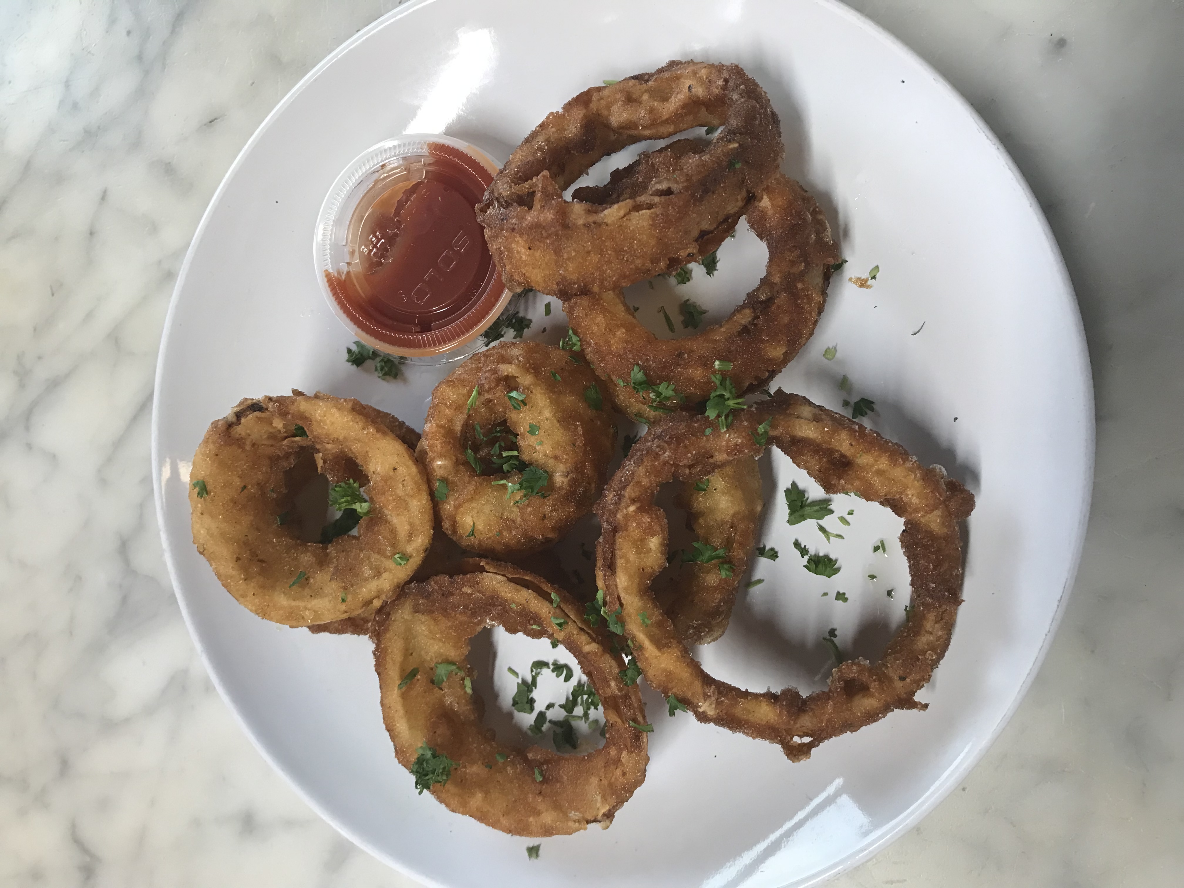 Order Homemade Onion Rings food online from Napolitano's Brooklyn Pizza store, Cranston on bringmethat.com