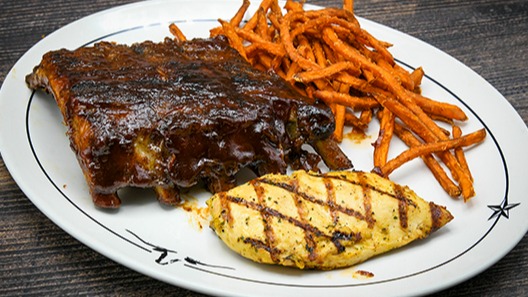 Order BBQ Pork Ribs & Grilled Chicken food online from Saltgrass Steak House store, Arlington on bringmethat.com