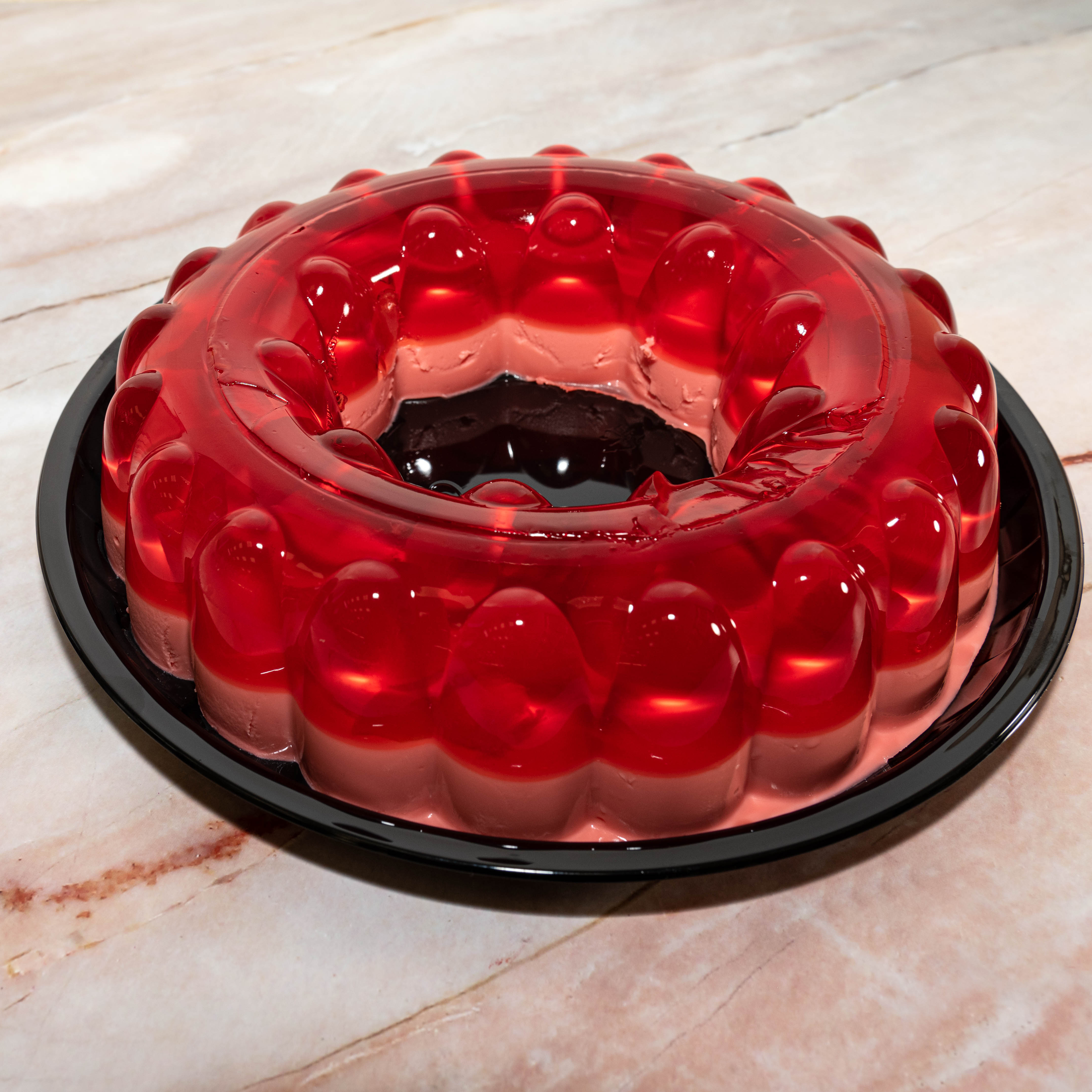 Order JELLO CAKE food online from Teapot Bakery And Cafe store, Glendale on bringmethat.com