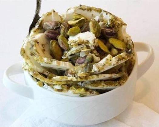 Order Pistachio ice cream food online from Taj Cafe store, Parma on bringmethat.com