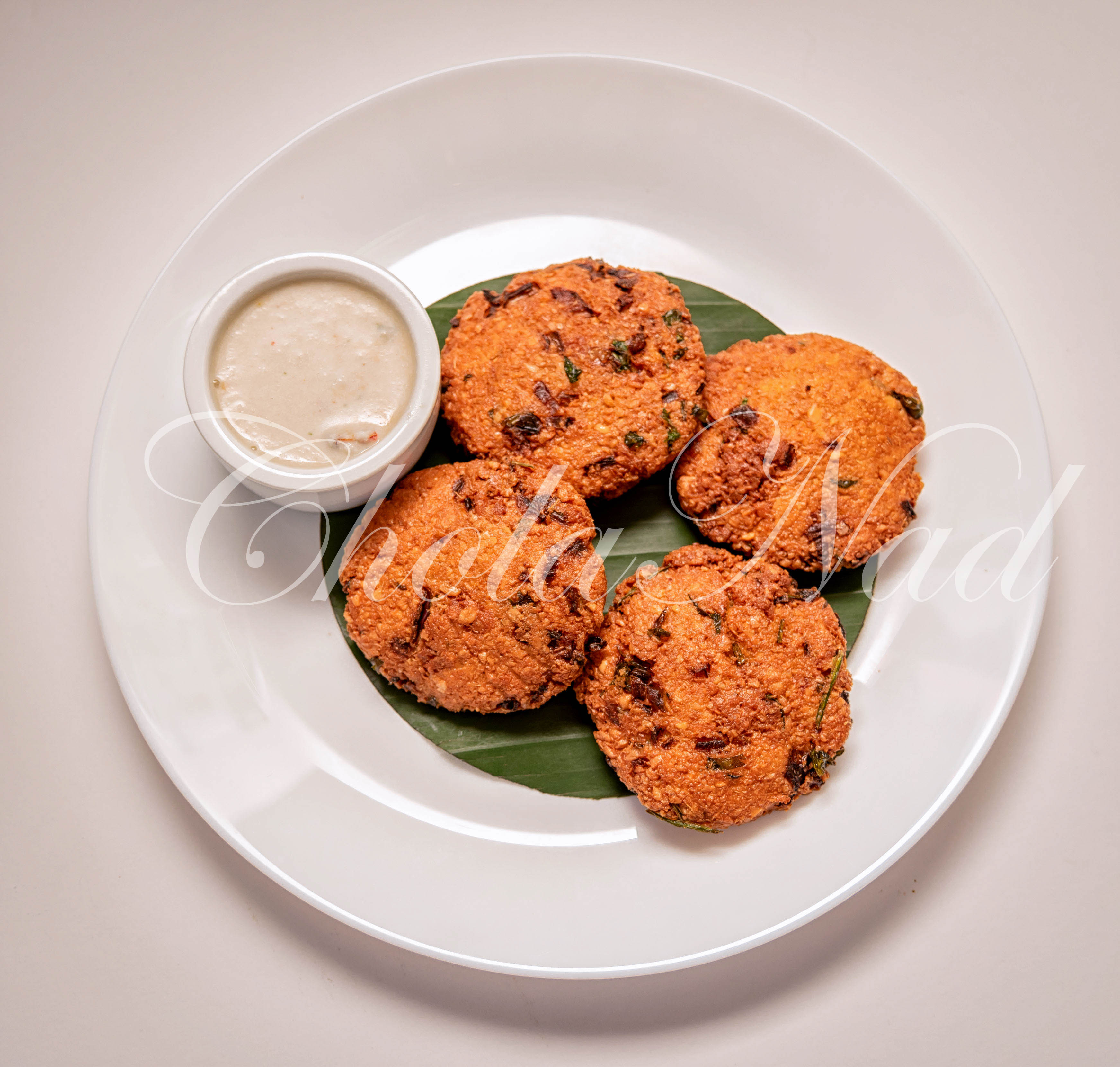 Order Dal Fritters food online from Cholanad store, Chapel Hill on bringmethat.com