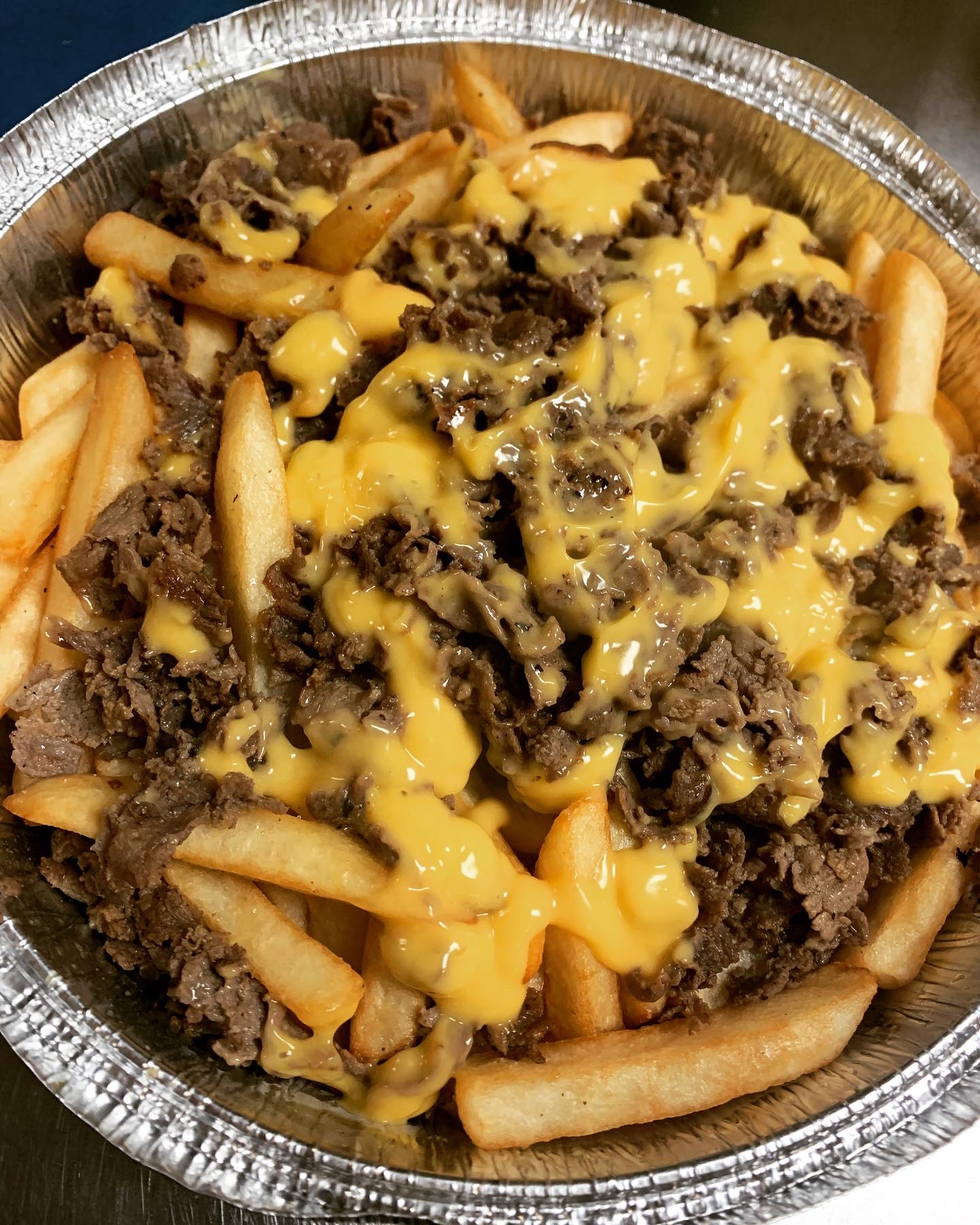 Order Eagles fries food online from New Station Pizza store, Souderton on bringmethat.com