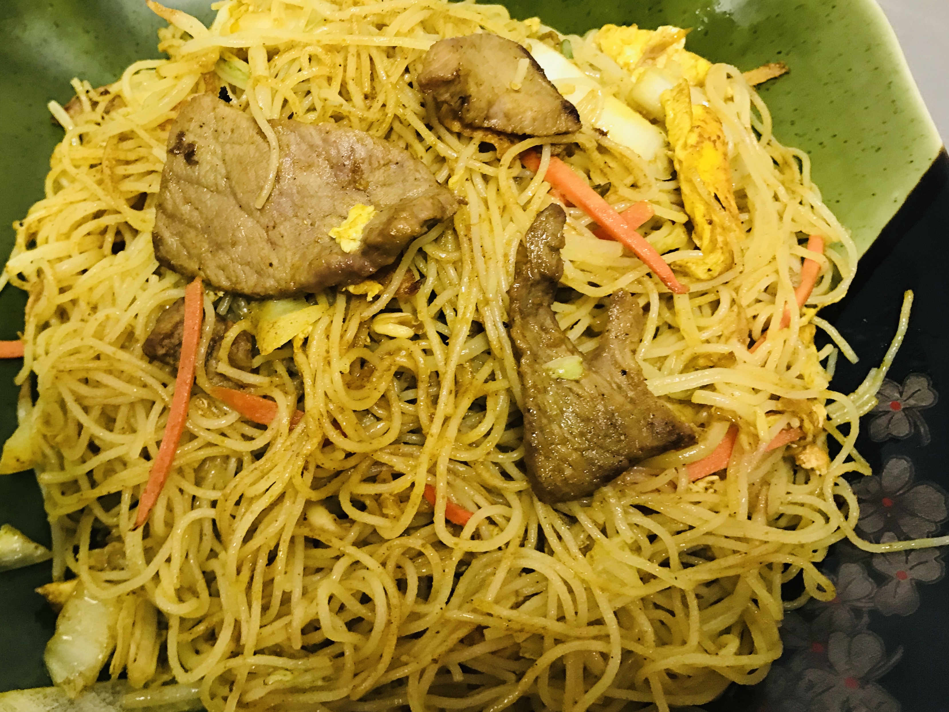 Order Singapore Rice Noodles food online from Tra Ling Oriental Cafe store, Boulder on bringmethat.com