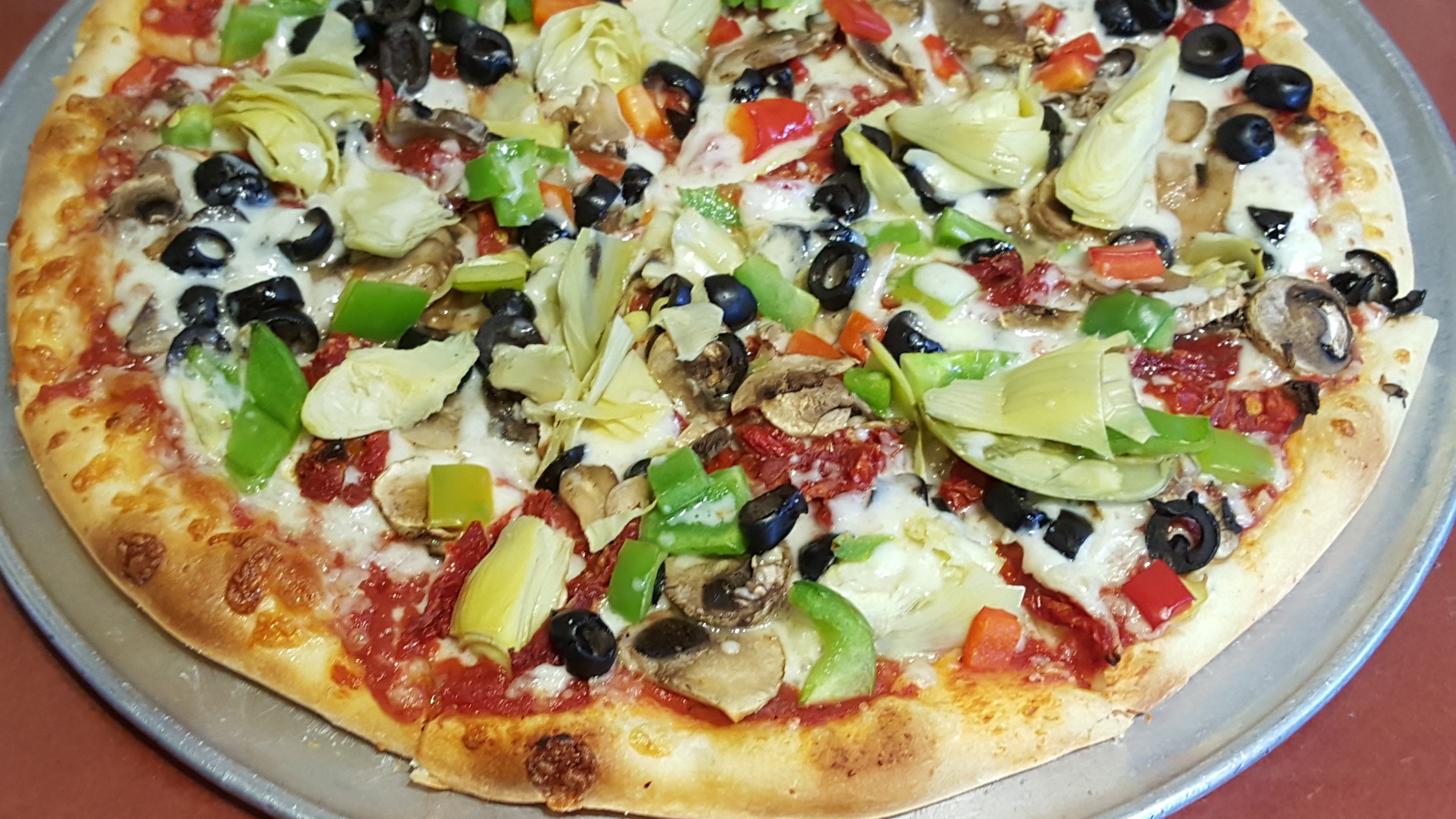 Order Vegetarian Specialty Pizza food online from Primo Pizza & Pasta store, Carlsbad on bringmethat.com