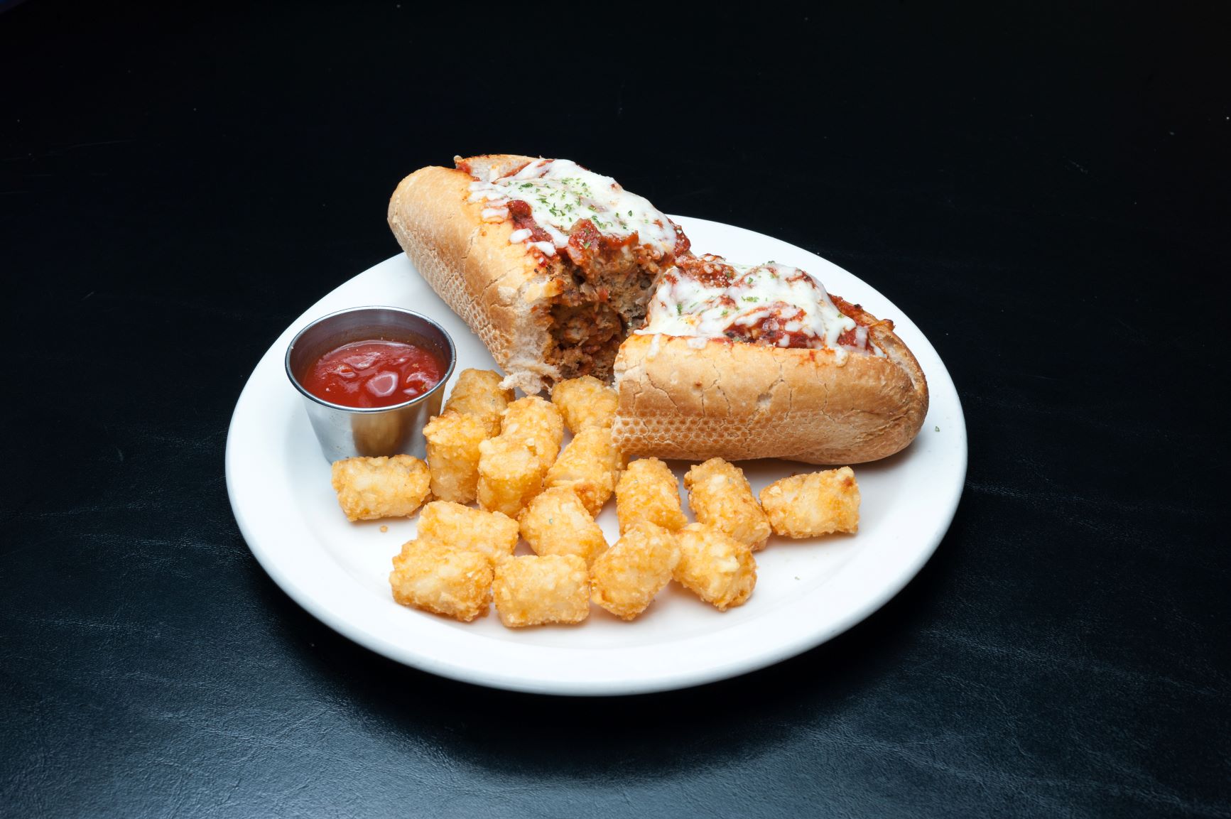Order Meatball Parmesan Sandwich food online from Falcone Pizzeria store, Oklahoma City on bringmethat.com