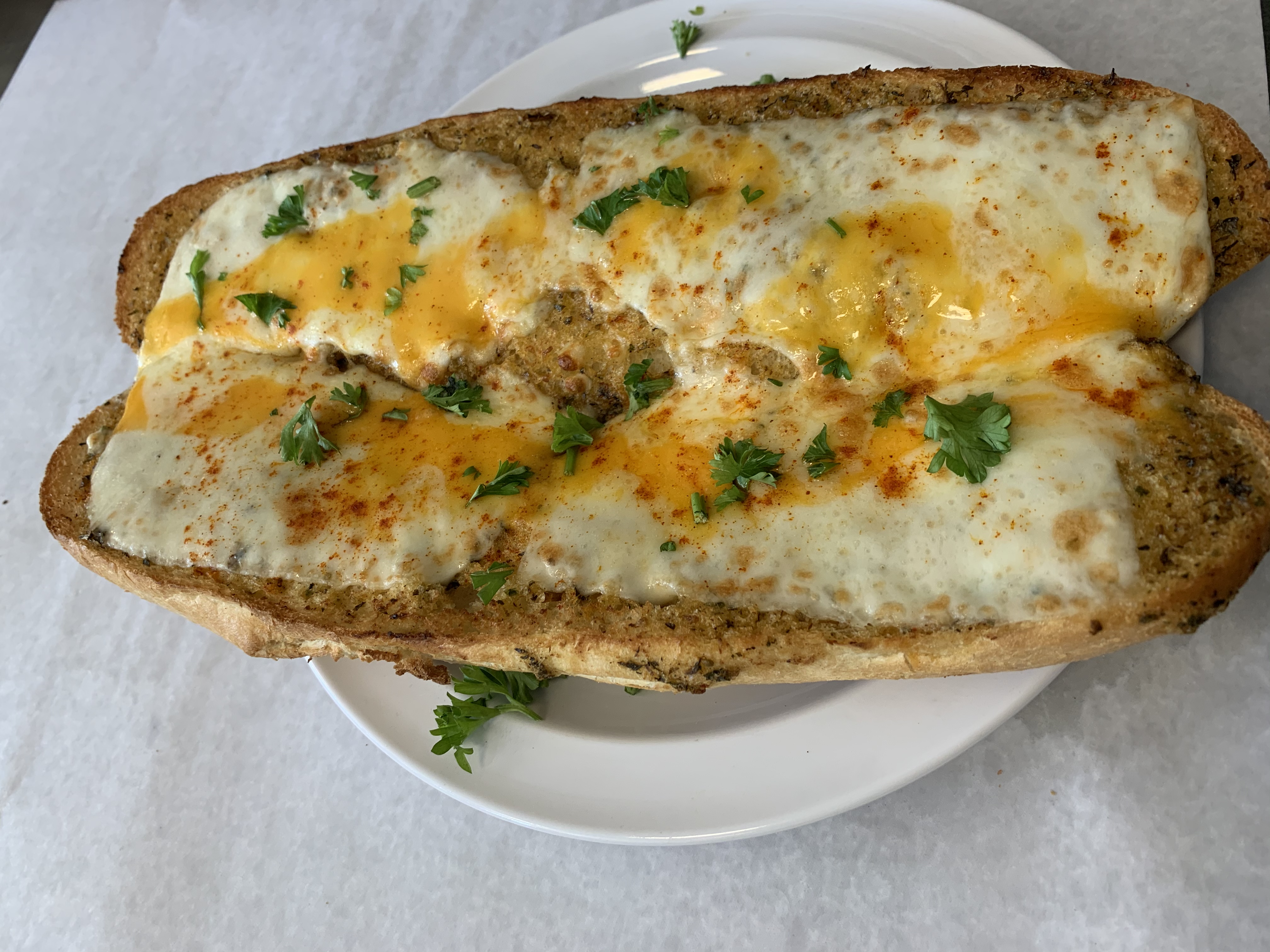 Order Garlic Bread with Cheese food online from Gregory House Of Pizza store, Belmont on bringmethat.com