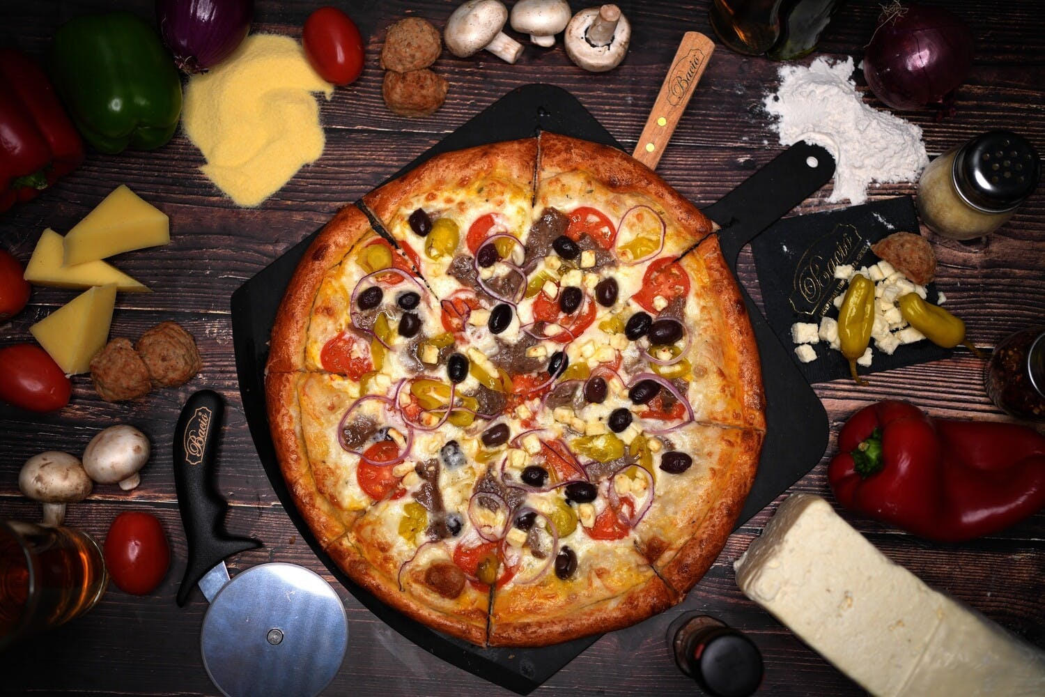 Order Greek Pizza - Medium 12'' (Round) food online from Golden Pizzeria store, Norfolk on bringmethat.com