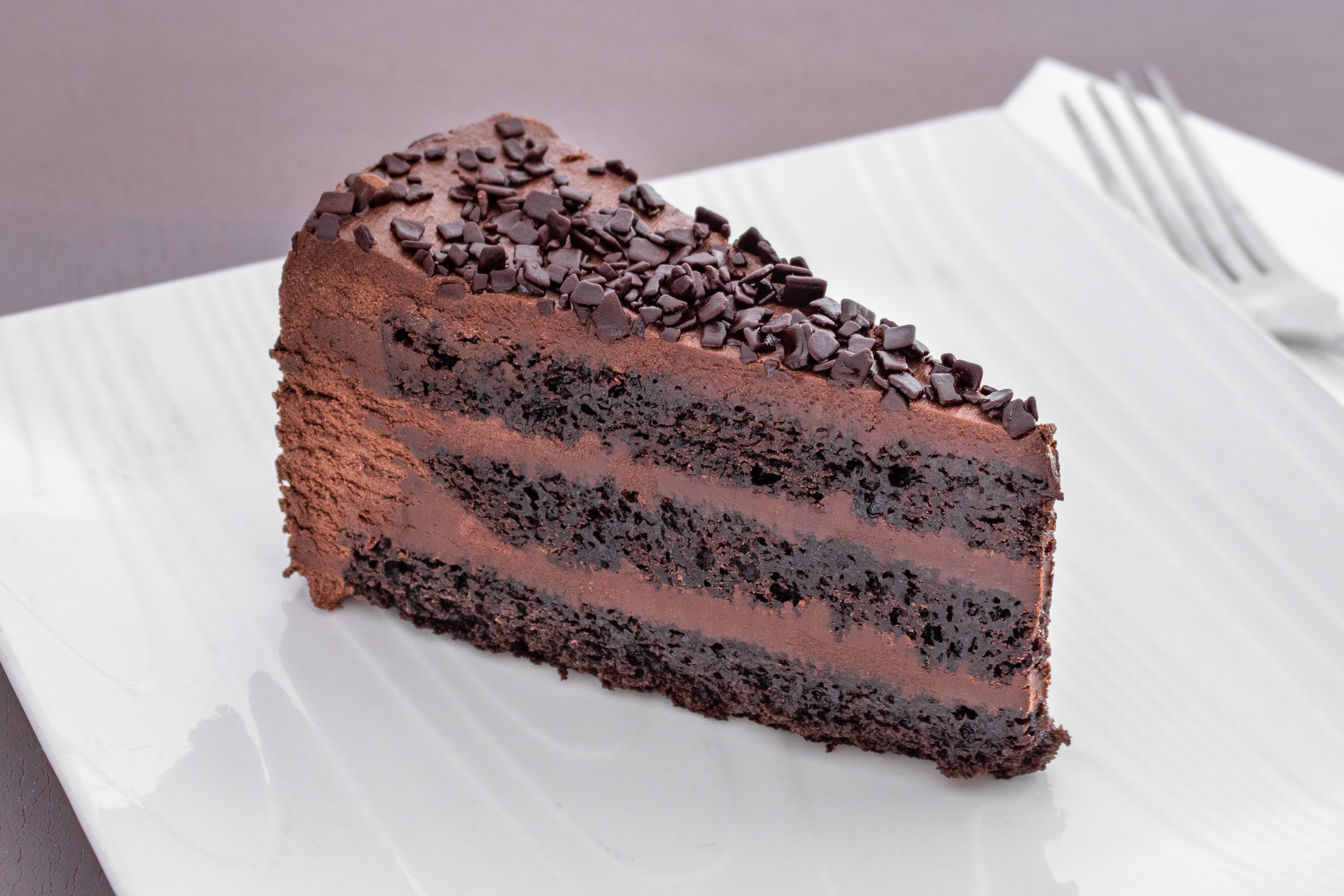 Order Triple Layered Chocolate Cake - Dessert food online from Johnnie's NY Pizza store, Venice on bringmethat.com
