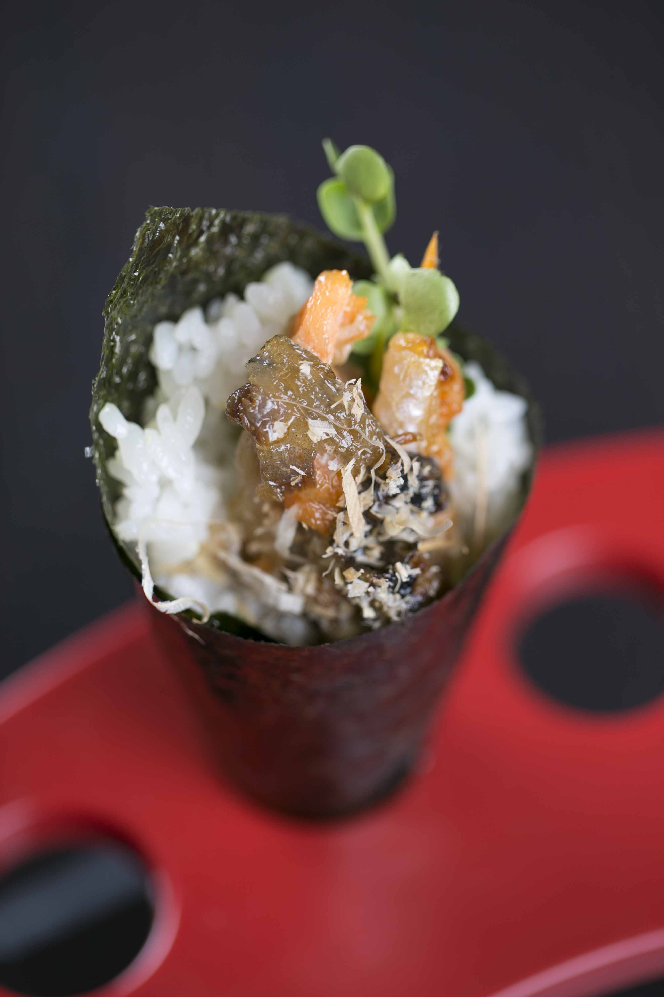 Order H9. Salmon Skin Hand Roll food online from Icho Izakaya Fusion Cuisine store, Temple City on bringmethat.com