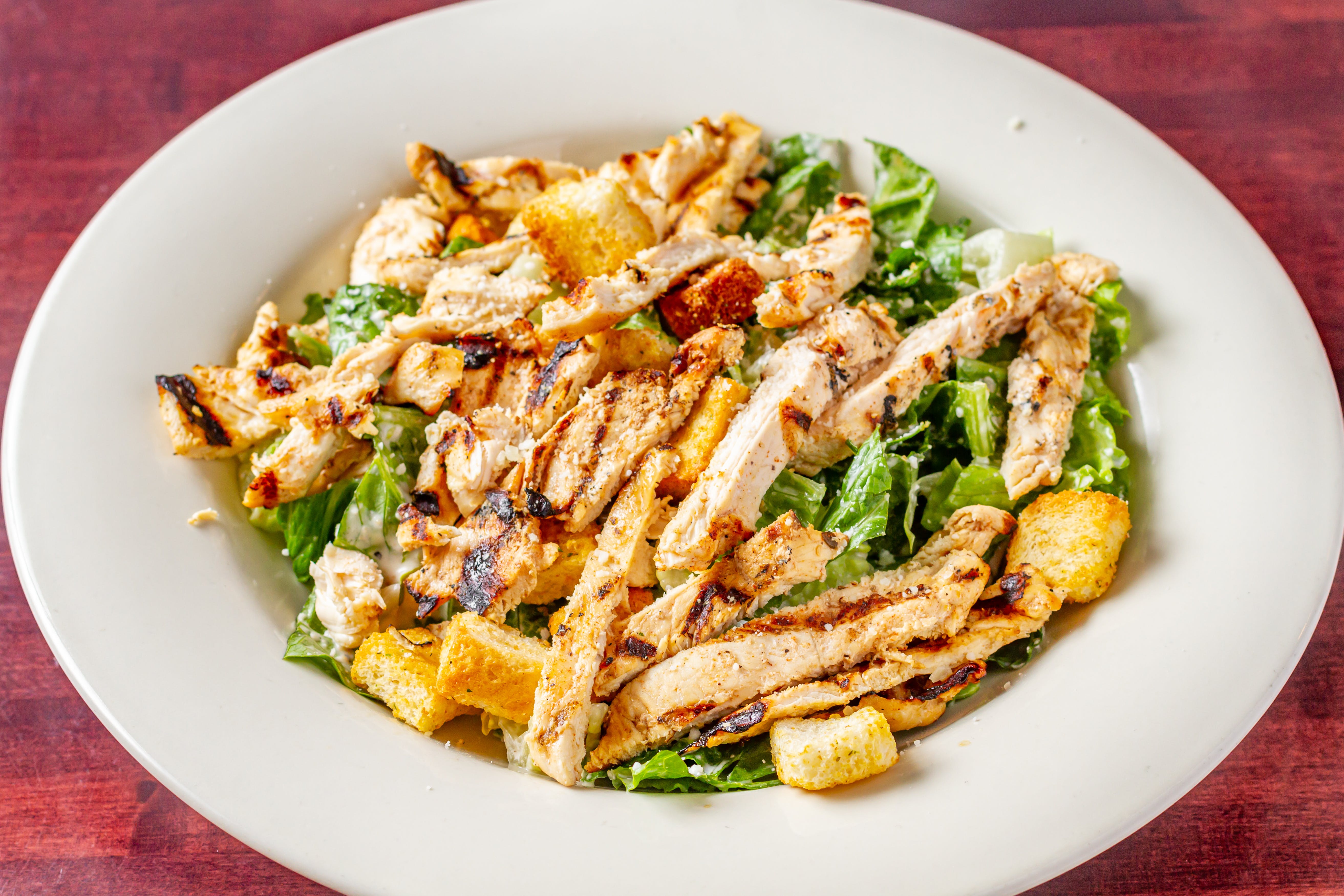 Order Chicken Caesar Salad - Regular food online from Bella Napoli store, Pasadena on bringmethat.com