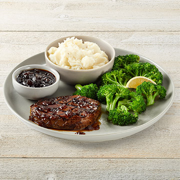 Order Center-cut Sirloin Steak Topped With Whiskey Glaze food online from Tgi Fridays store, Madison on bringmethat.com
