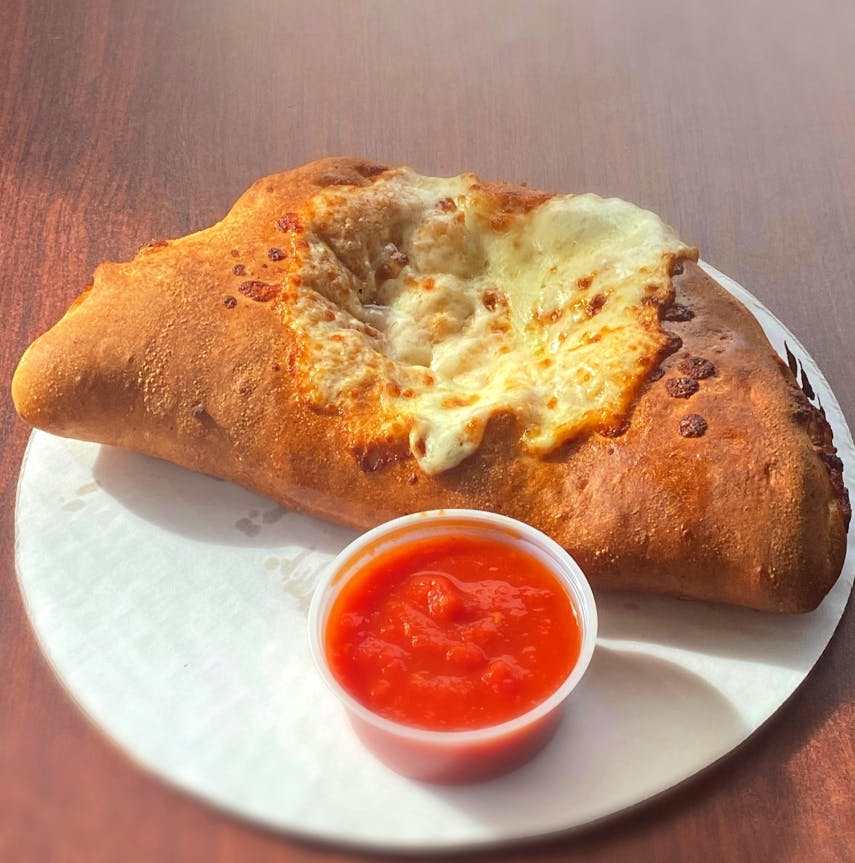 Order Steak Calzone - Small food online from Little Pizza King store, Brighton on bringmethat.com