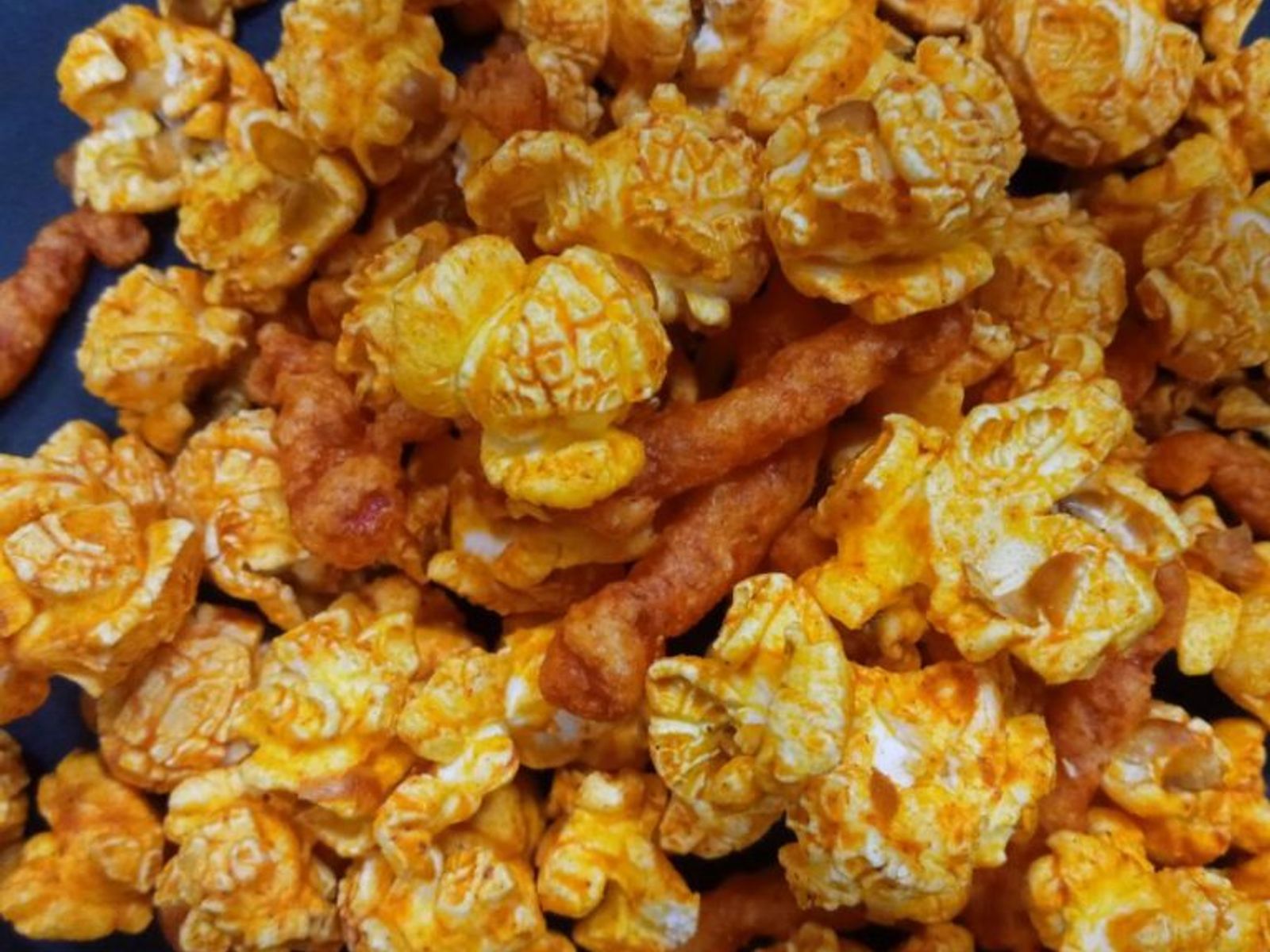 Order HOT CHEETOS food online from Poparazzis Popcorn store, Houston on bringmethat.com