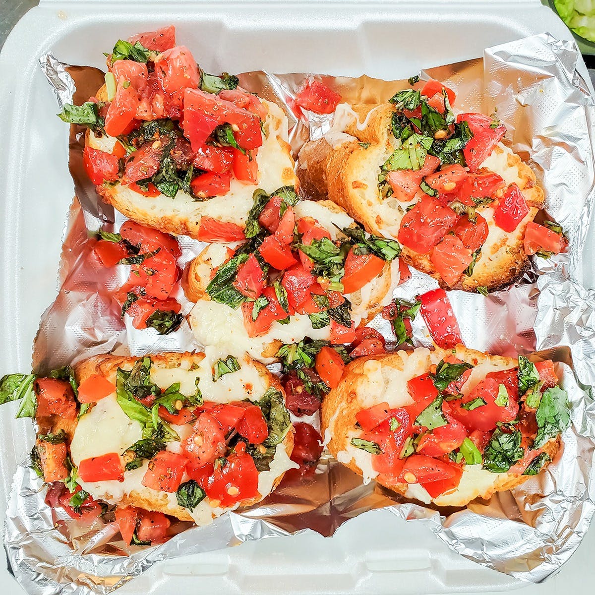 Order Bruschetta - Appetizer food online from Napoli Pizza store, Henderson on bringmethat.com