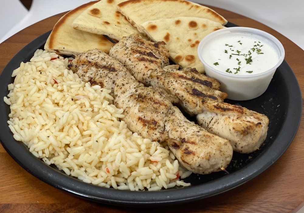 Order Chicken Souvlaki Plate w/ Rice food online from Evan's store, Des Plaines on bringmethat.com
