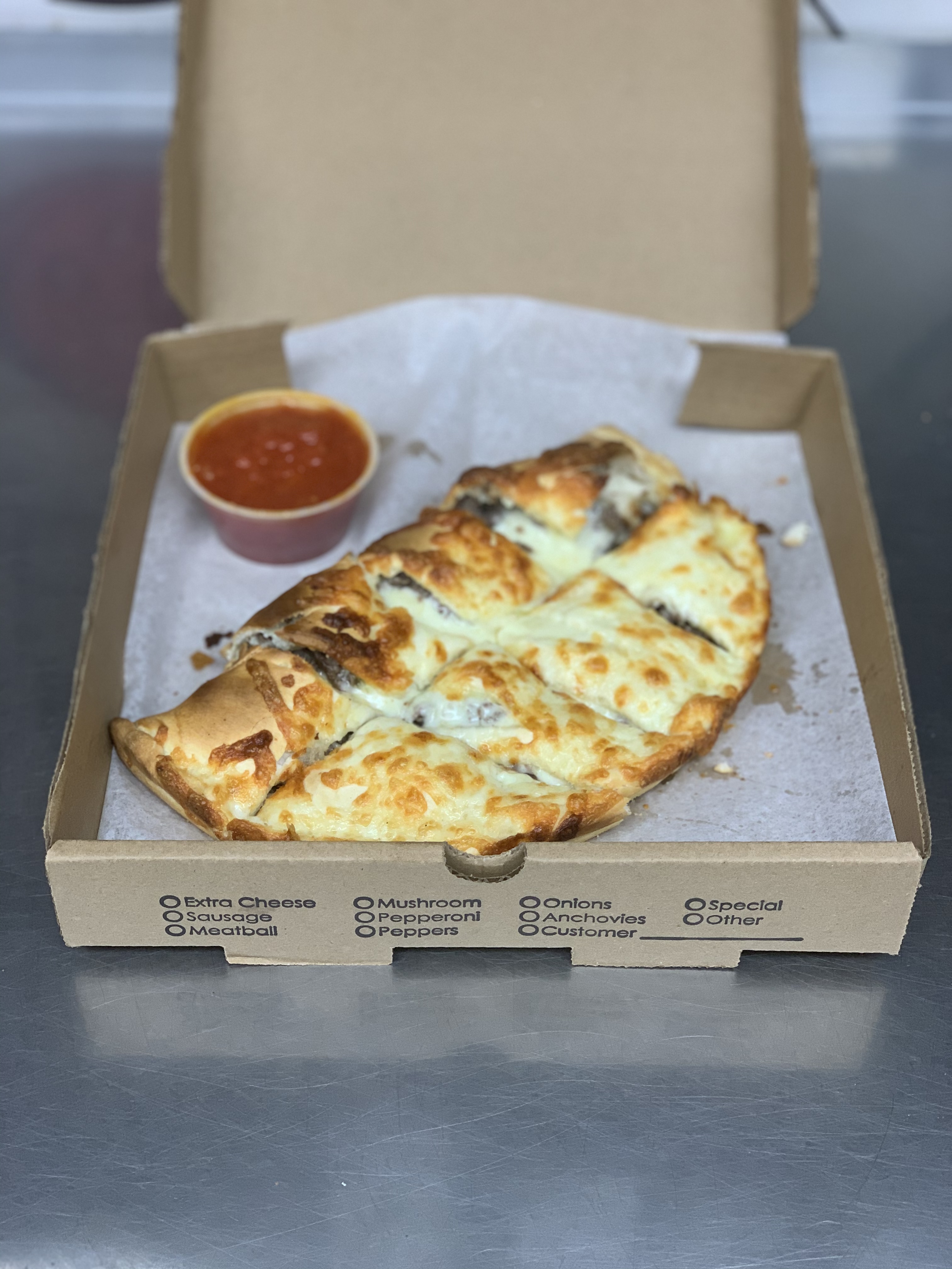 Order Philly Steak Combo Gourmet Calzone food online from Nicks Pizza & Seafood store, Boston on bringmethat.com