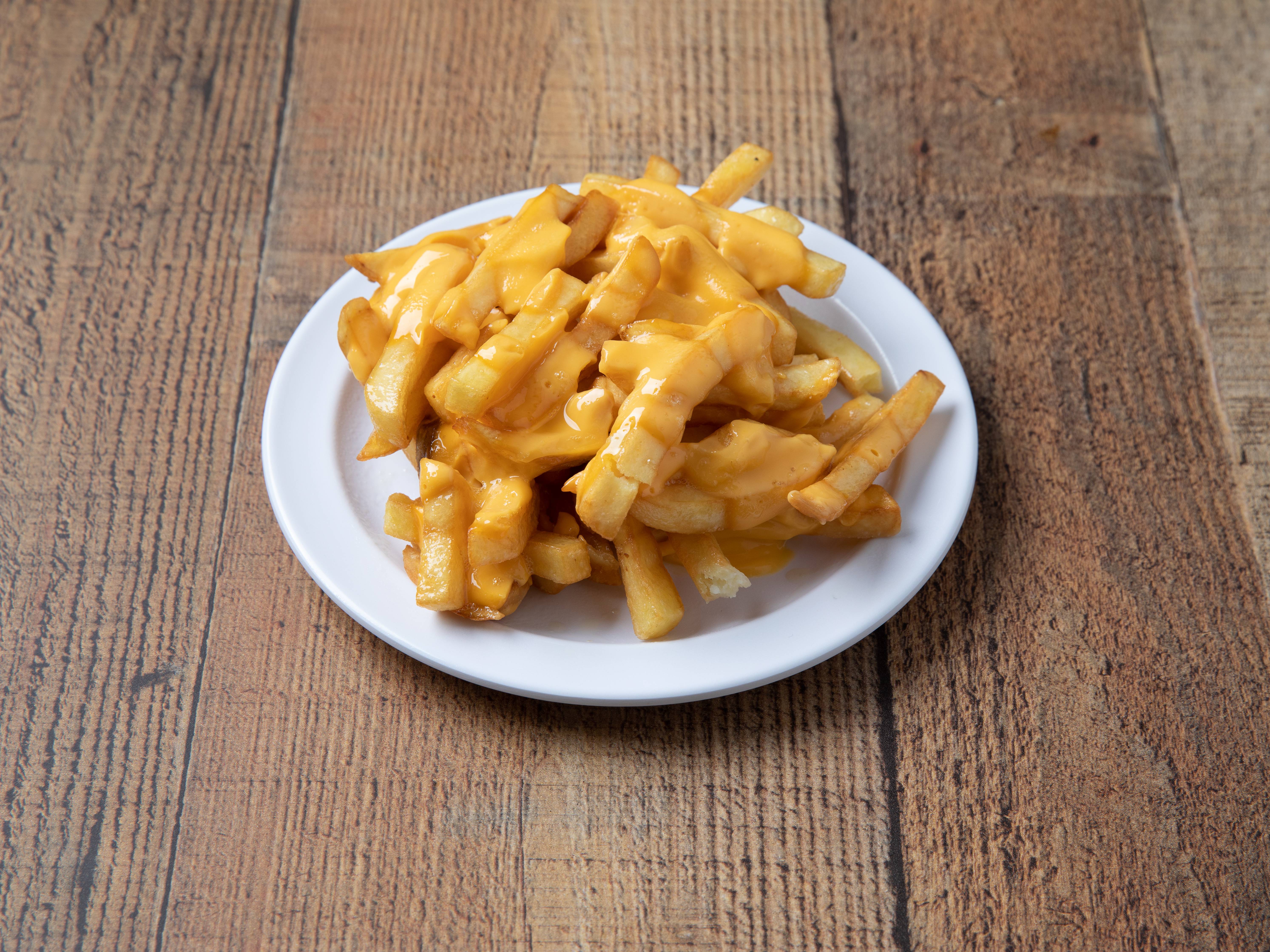 Order Cheese Fries food online from Captain Grill store, Cleveland on bringmethat.com