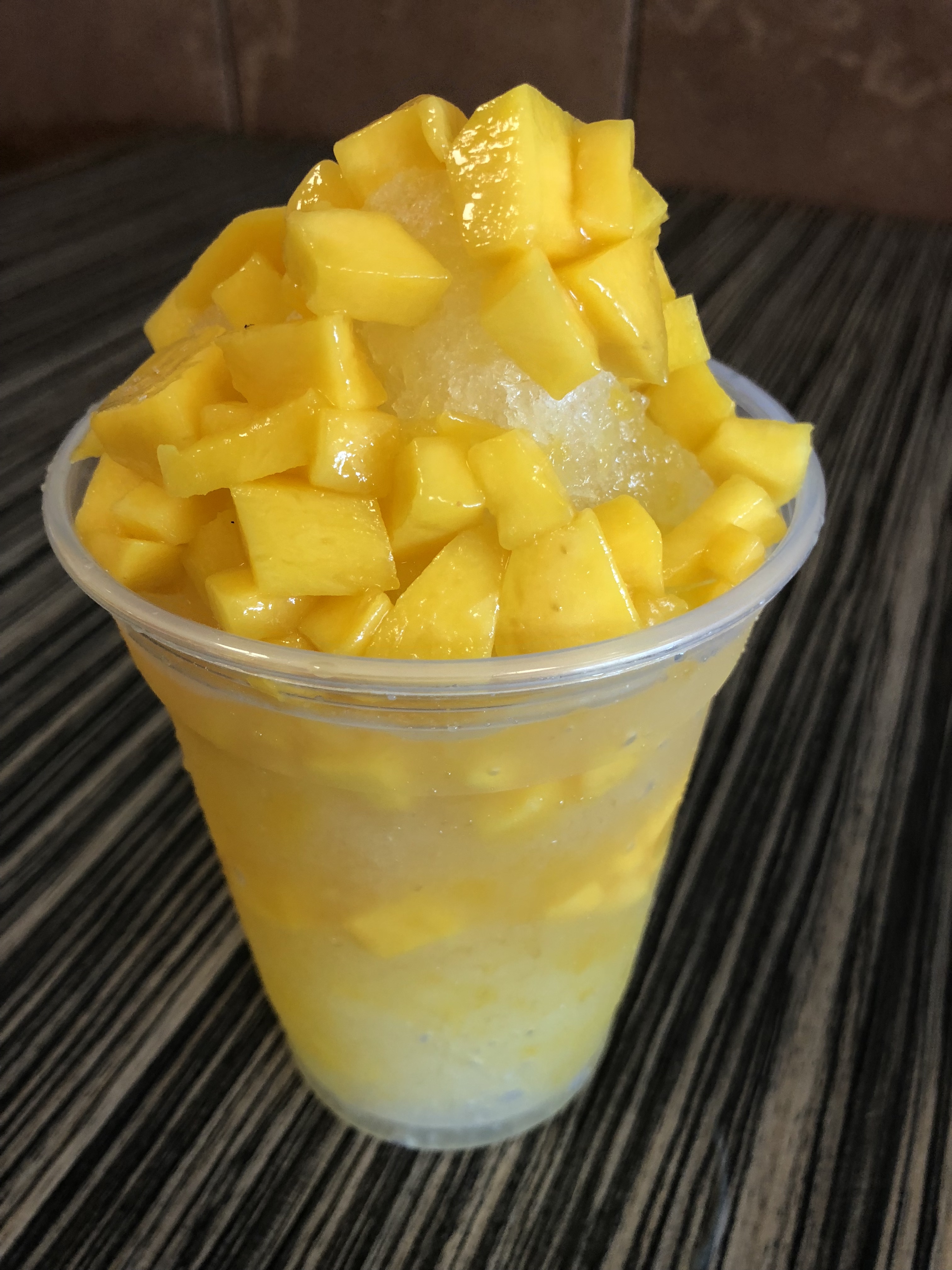 Order Mango Shaved Ice food online from Dulce Antojitos store, Pittsburg on bringmethat.com