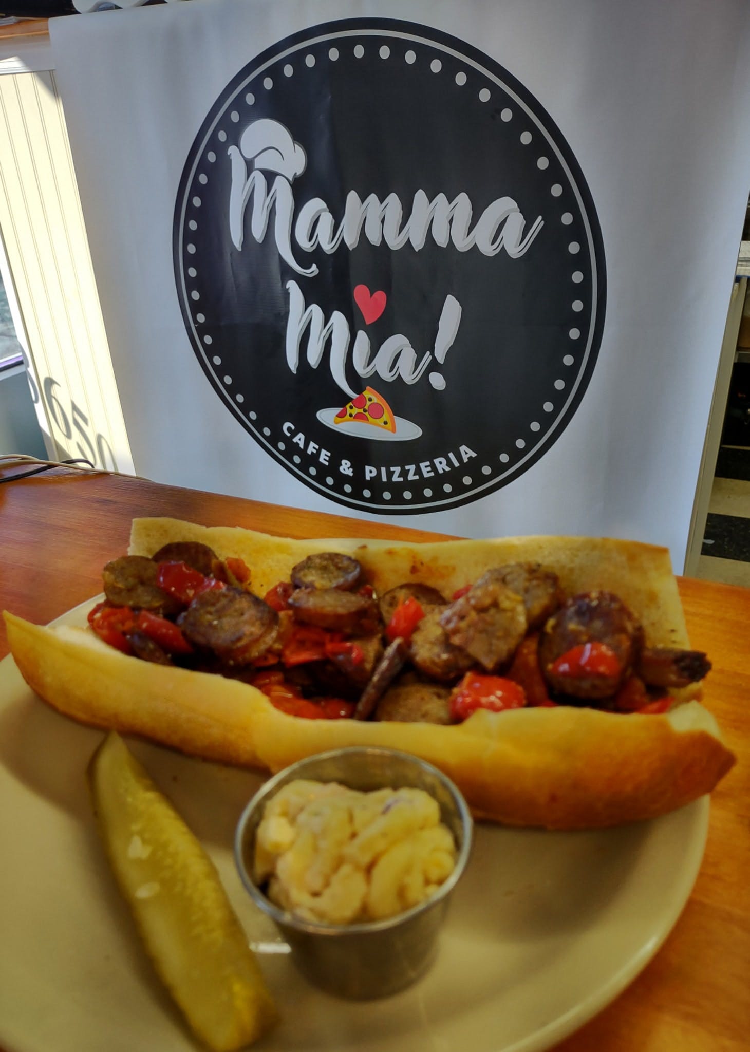 Order Sausage & Peppers Hero - Hero food online from Mamma Mia! Cafe & Pizzeria store, New Windsor on bringmethat.com