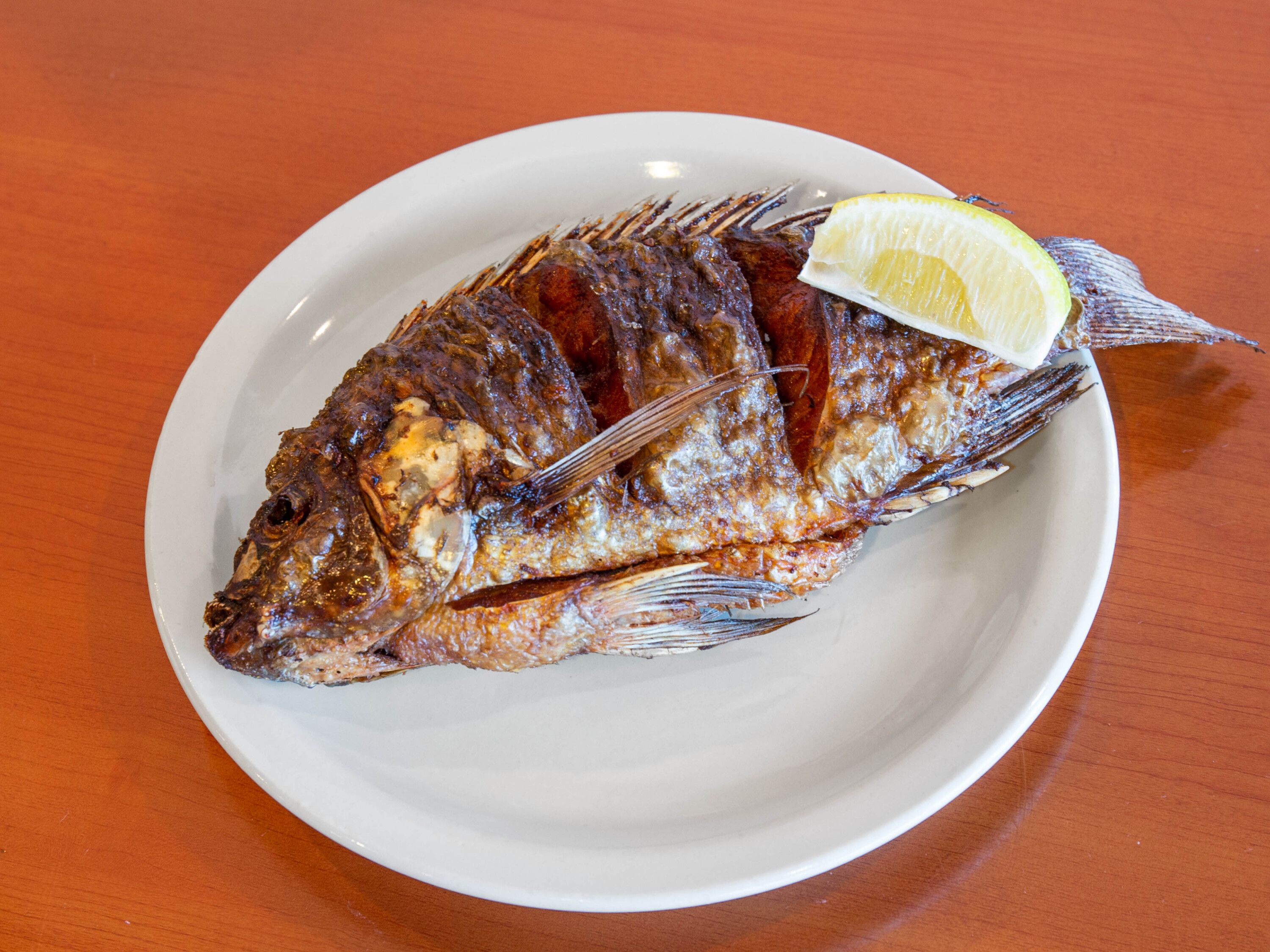 Order 1 Piece Fried Tilapia food online from China Buffet store, Omaha on bringmethat.com