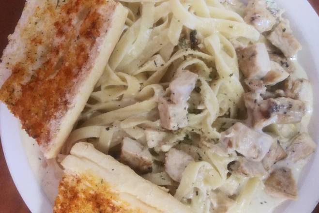 Order Fettuccini Alfredo with Chicken food online from Potesta's Pizza Pasta store, Zion on bringmethat.com