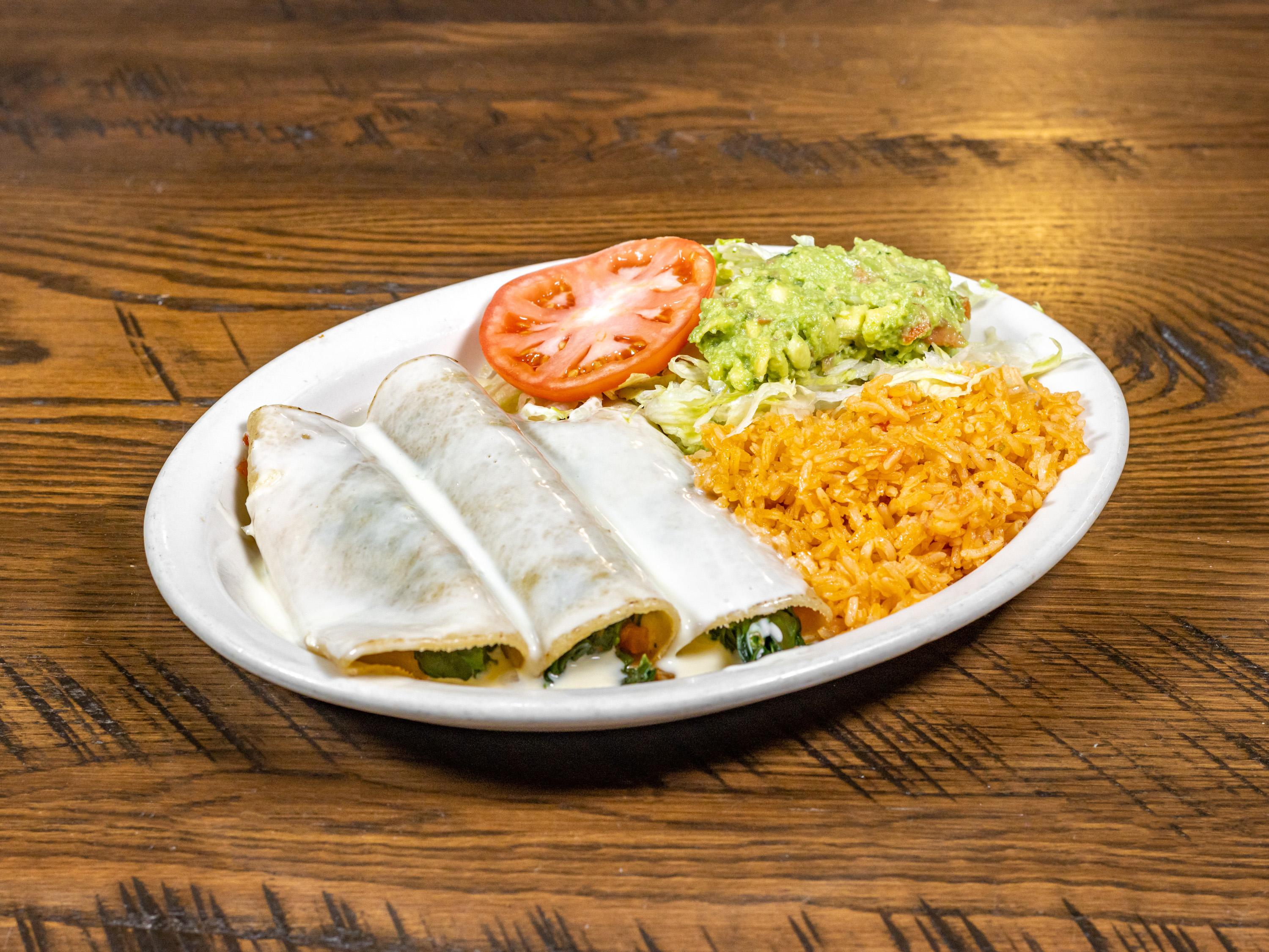 Order Spinach ＆ Cheese Enchilada food online from El Meson store, Cuyahoga Falls on bringmethat.com