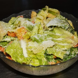 Order Caesar Salad food online from Uncle Sams store, Peoria on bringmethat.com