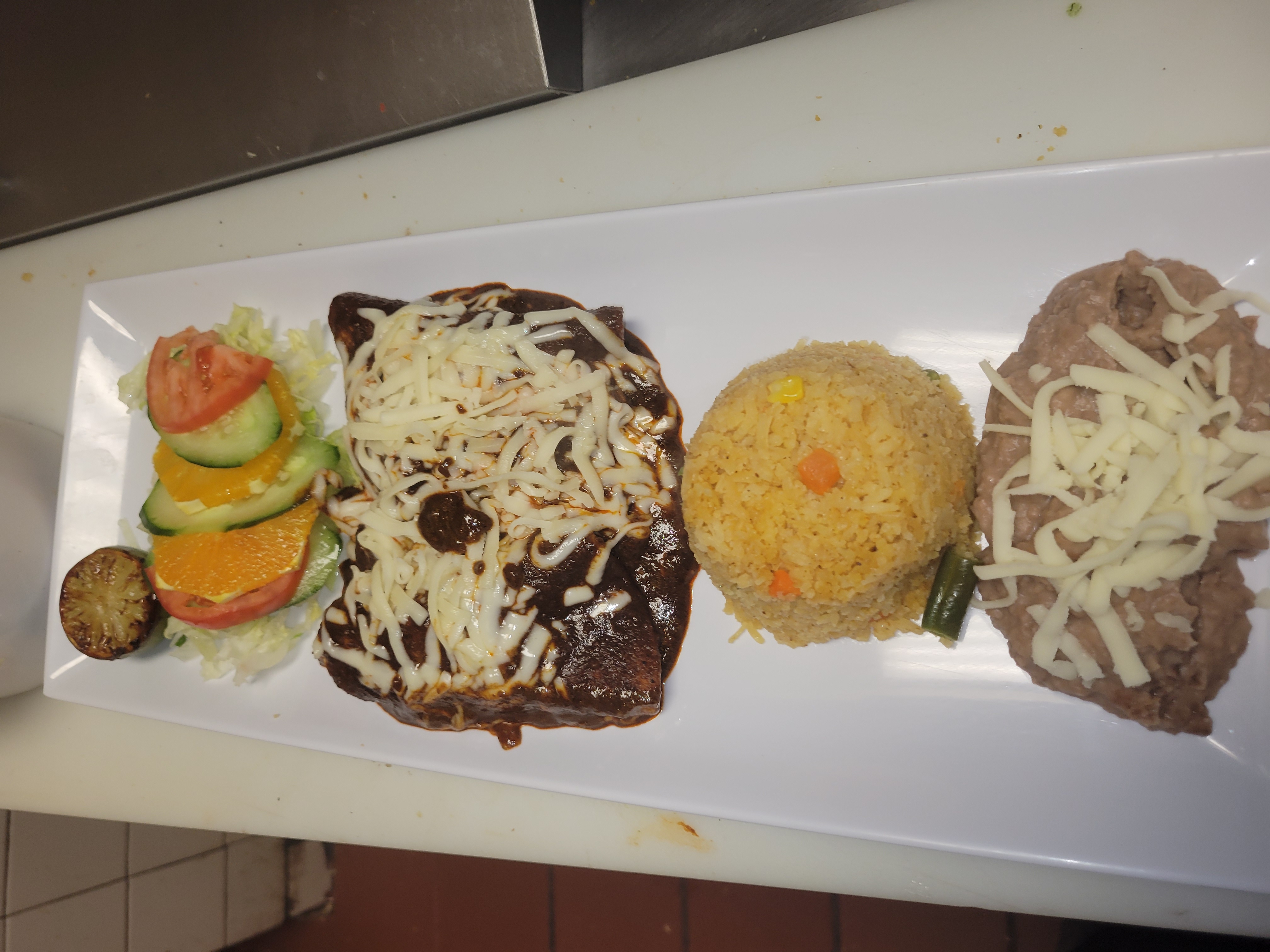 Order Enchiladas Plate food online from La Catrina Restaurant store, Chicago on bringmethat.com