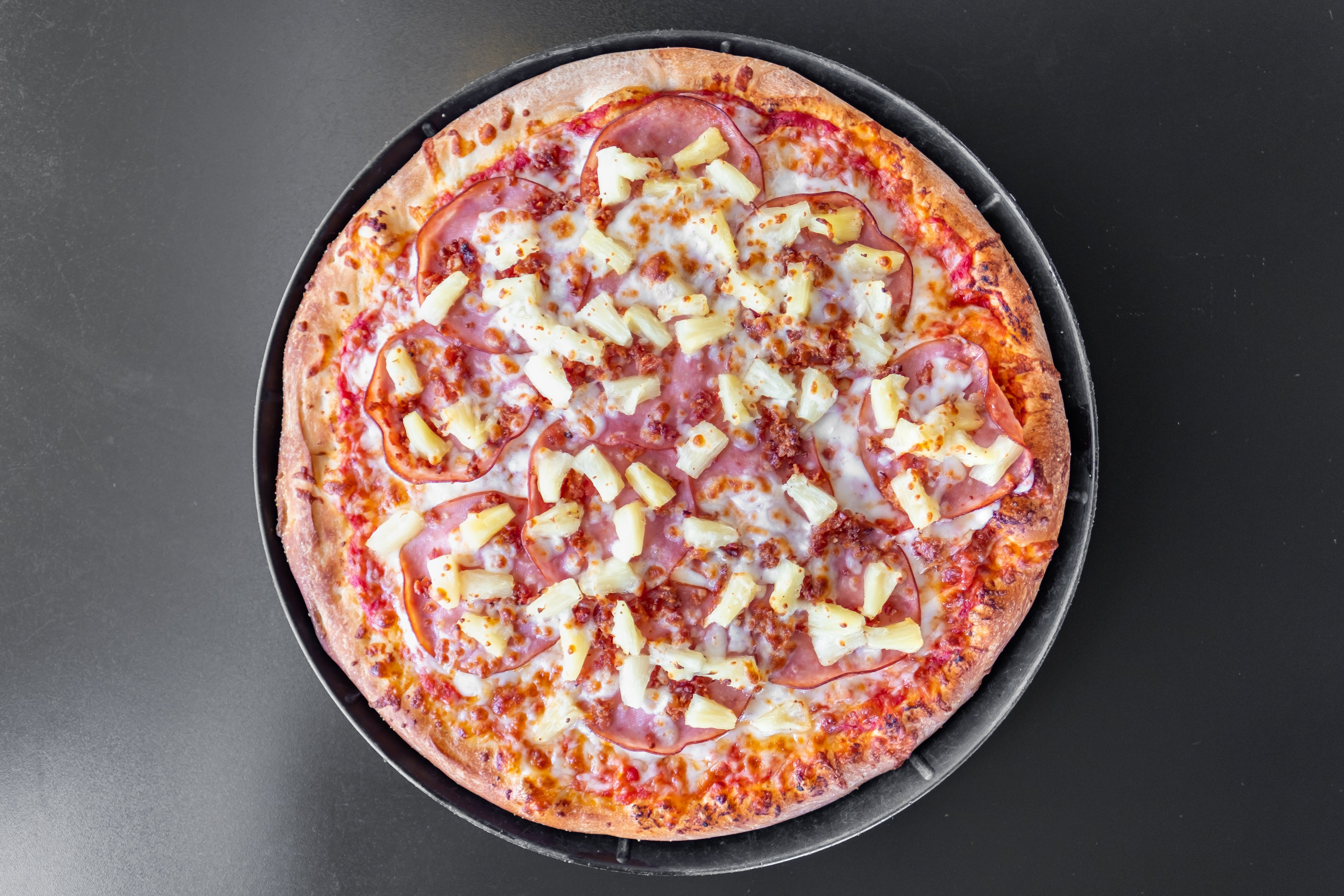 Order Hawaii Canadian Bacon & Pineapple Pizza - Large 14" (Serves 3-6) food online from Neighbors Pizza store, Olivehurst on bringmethat.com