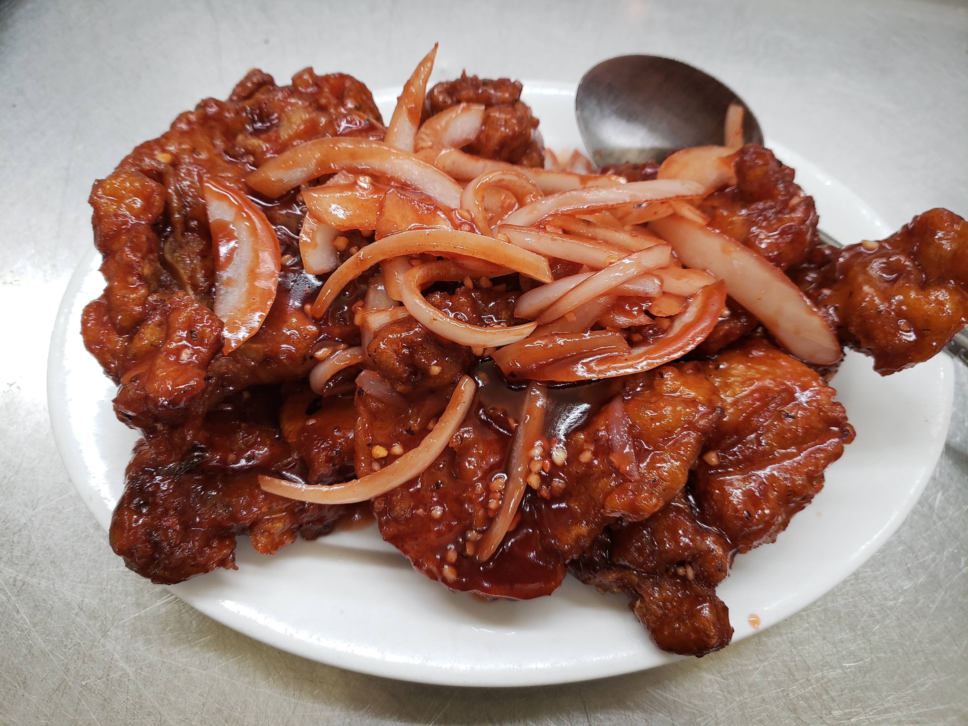 Order 31. Pork Chop with Peking Style food online from Dragon King Restaurant store, Canoga Park on bringmethat.com