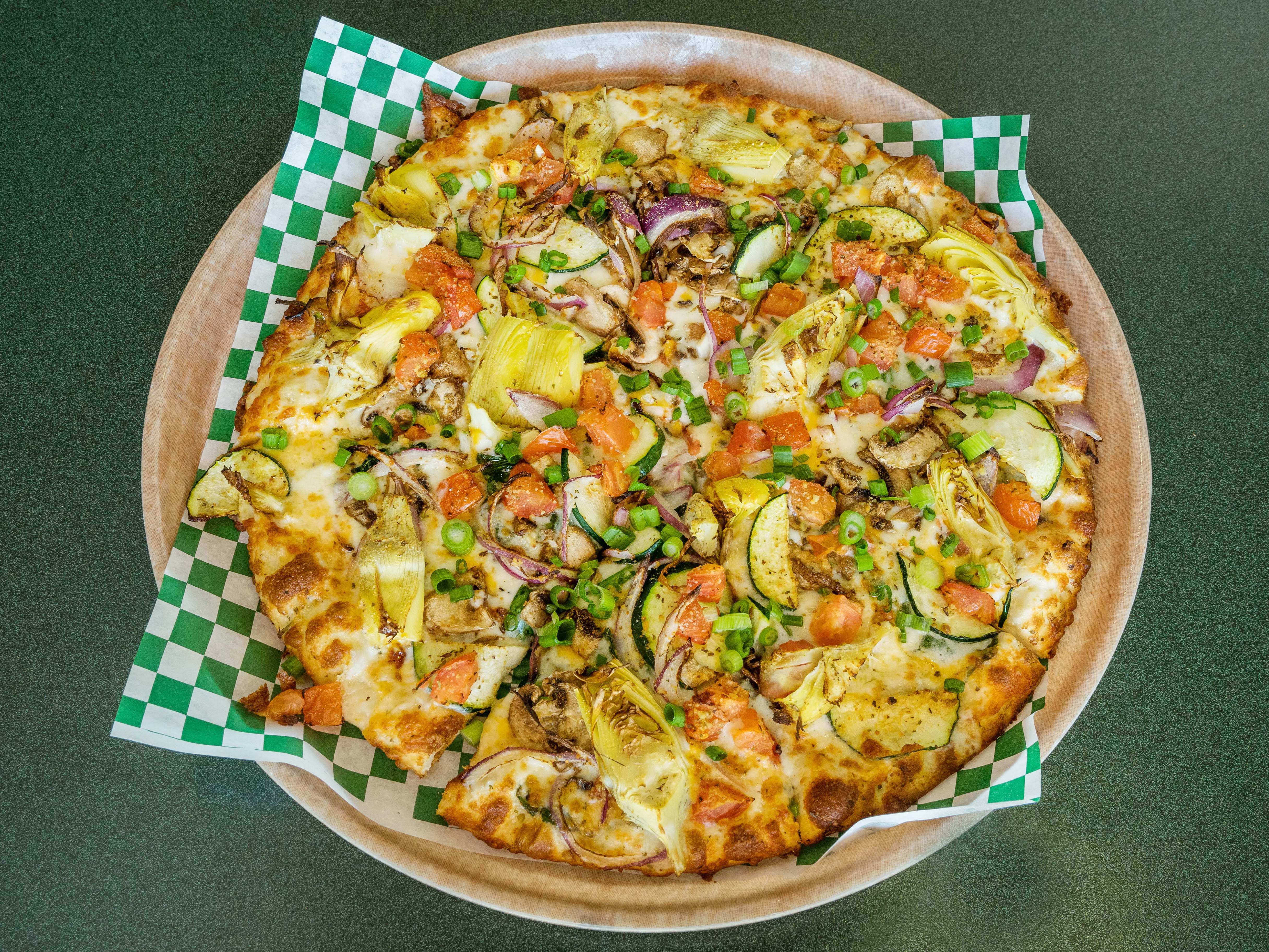Order Veggie Guinevere's Garden Delight Pizza food online from Round Table Pizza store, Lake Forest on bringmethat.com