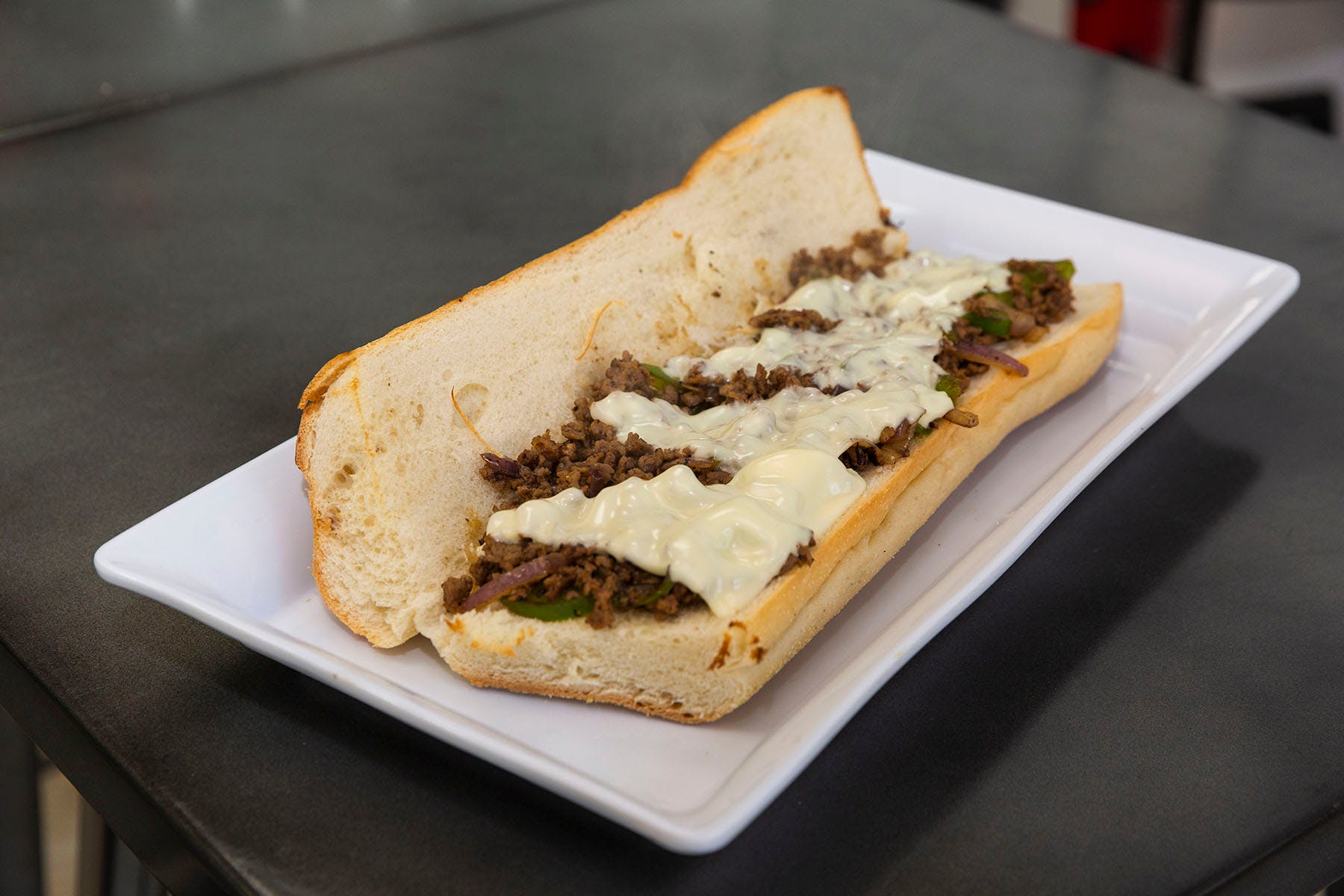 Order Philly Steak Sub - Subs food online from College Pizza store, Boston on bringmethat.com
