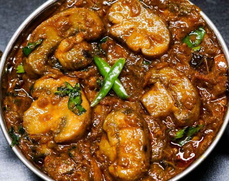 Order Curry - Mushroom & Paneer Masala food online from Indian Street Cafe store, San Jose on bringmethat.com