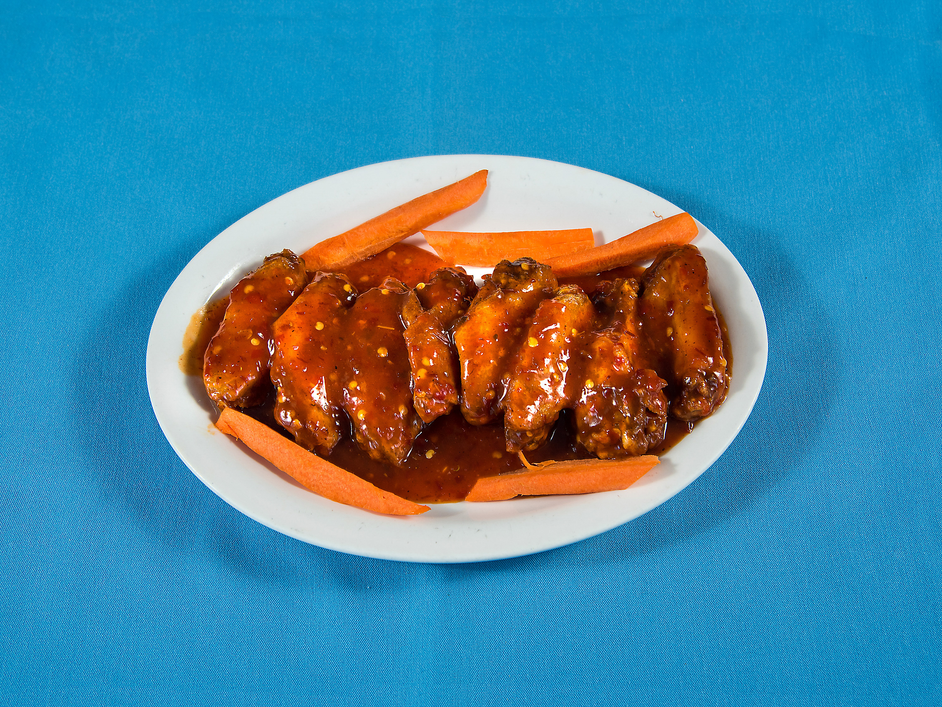 Order Caribbean Mango Habanero Chicken Wings food online from Taste Of The Cribbean store, Albuquerque on bringmethat.com