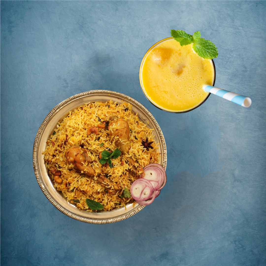 Order Chicken Biryani Peshawari & Yogurt Mango Shake food online from Gunpowder Cafe store, Suwanee on bringmethat.com