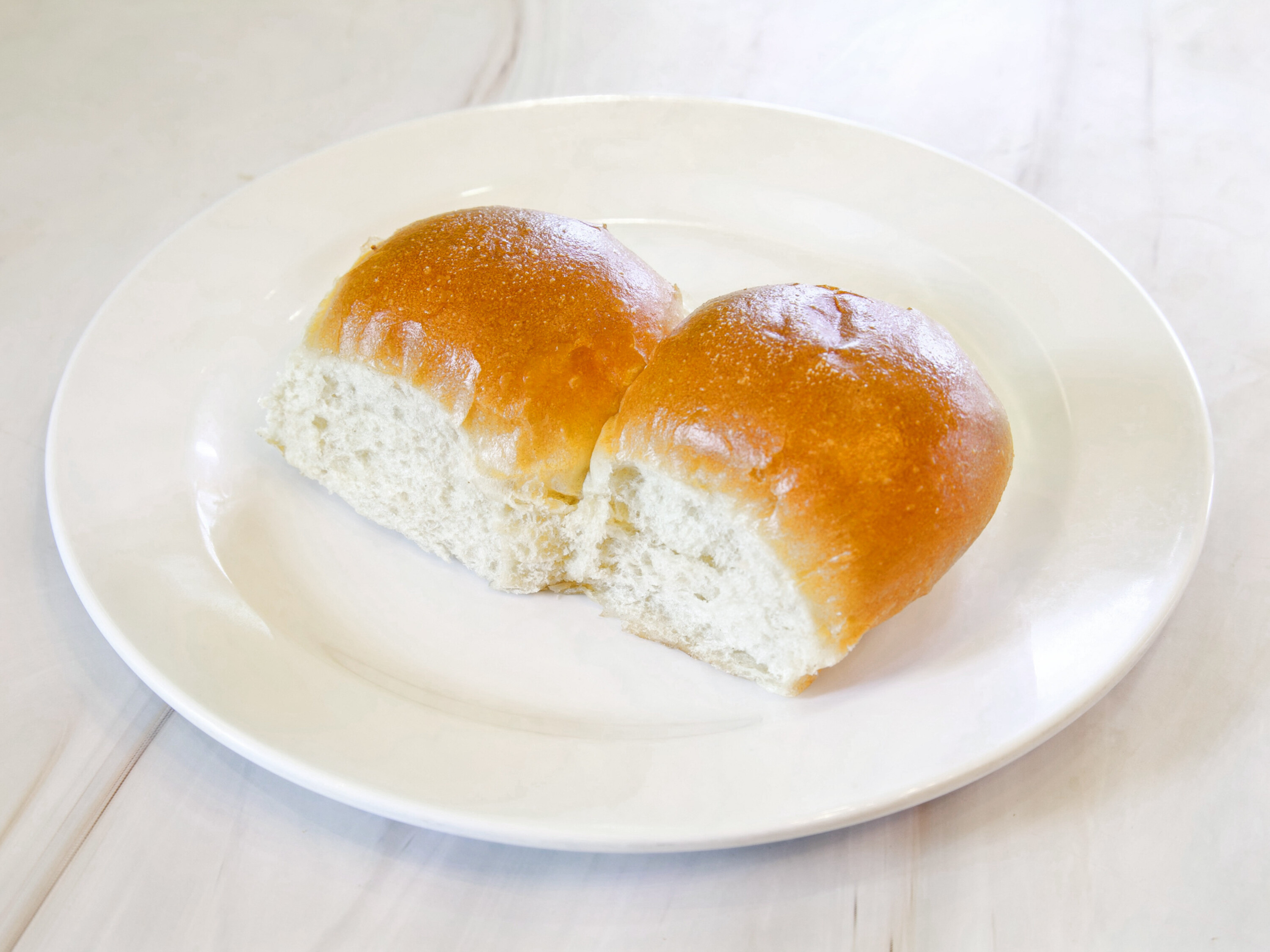 Order 2 Piece Butter Pav  food online from Rajwadi Thali Chaat & Sweets store, Fremont on bringmethat.com