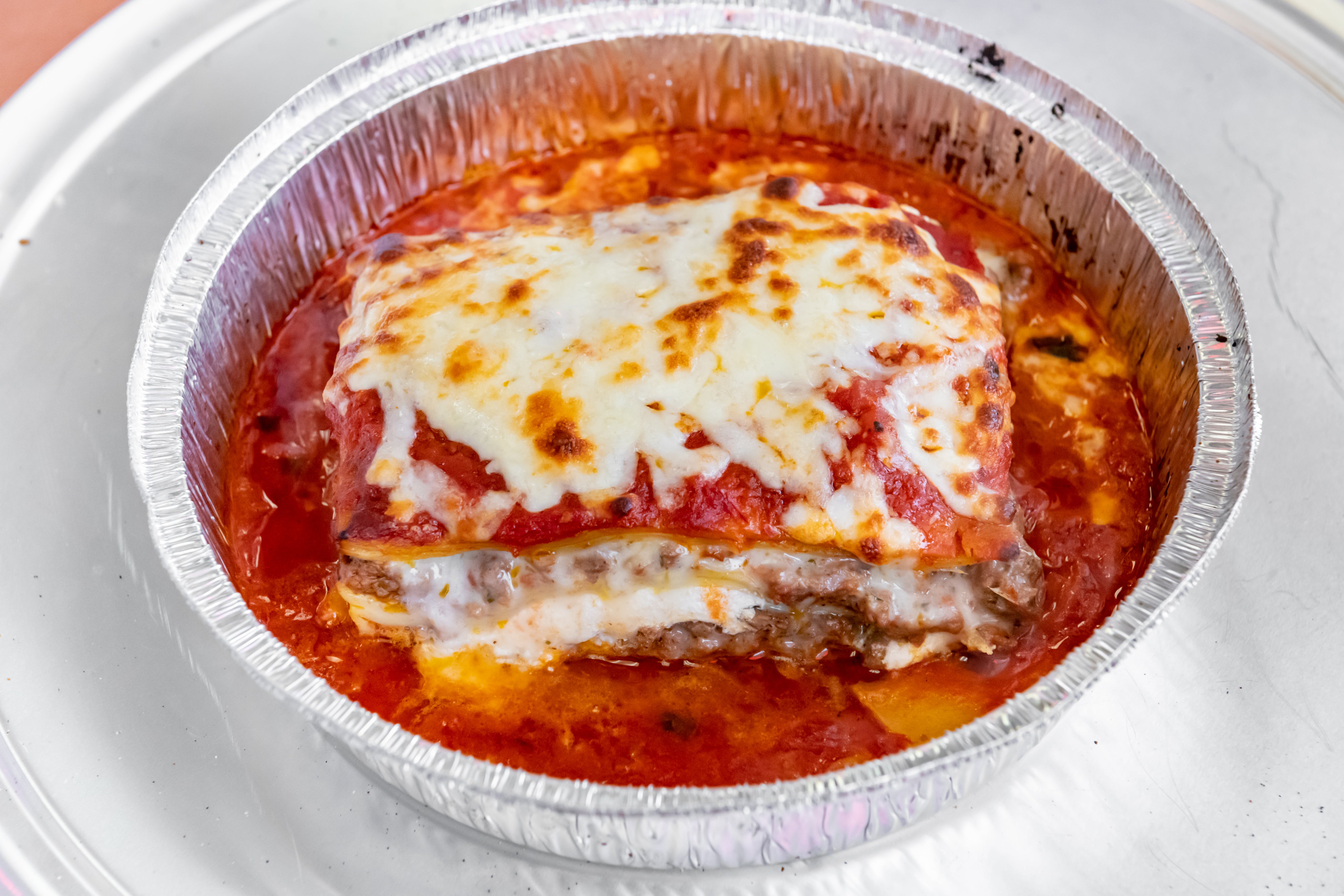 Order Meat Lasagna Dinner - Dinner food online from Renaldo's Apizza & Catering store, Southington on bringmethat.com